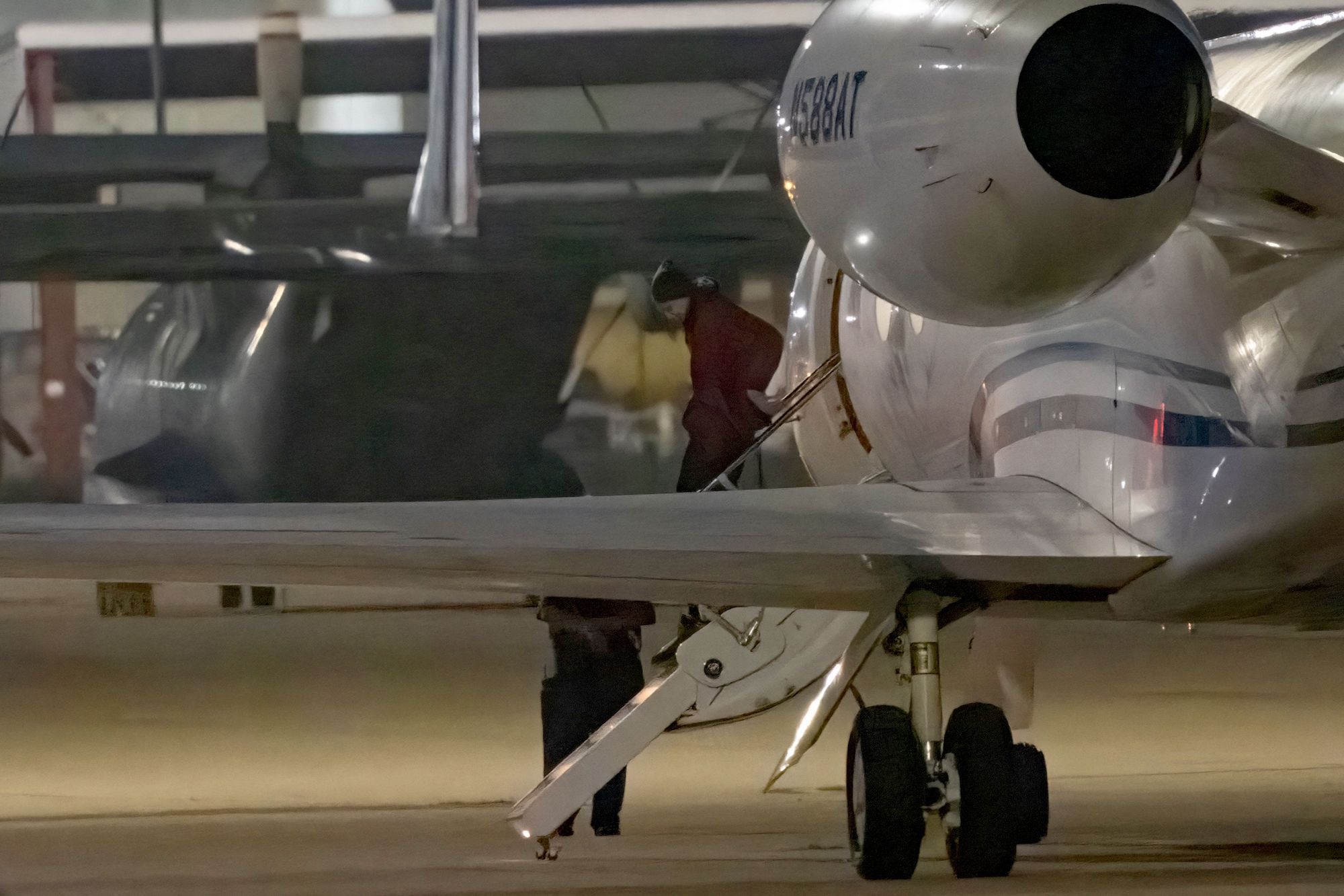 Brittney Griner exits a plane after landing at the in San Antonio on Friday. 