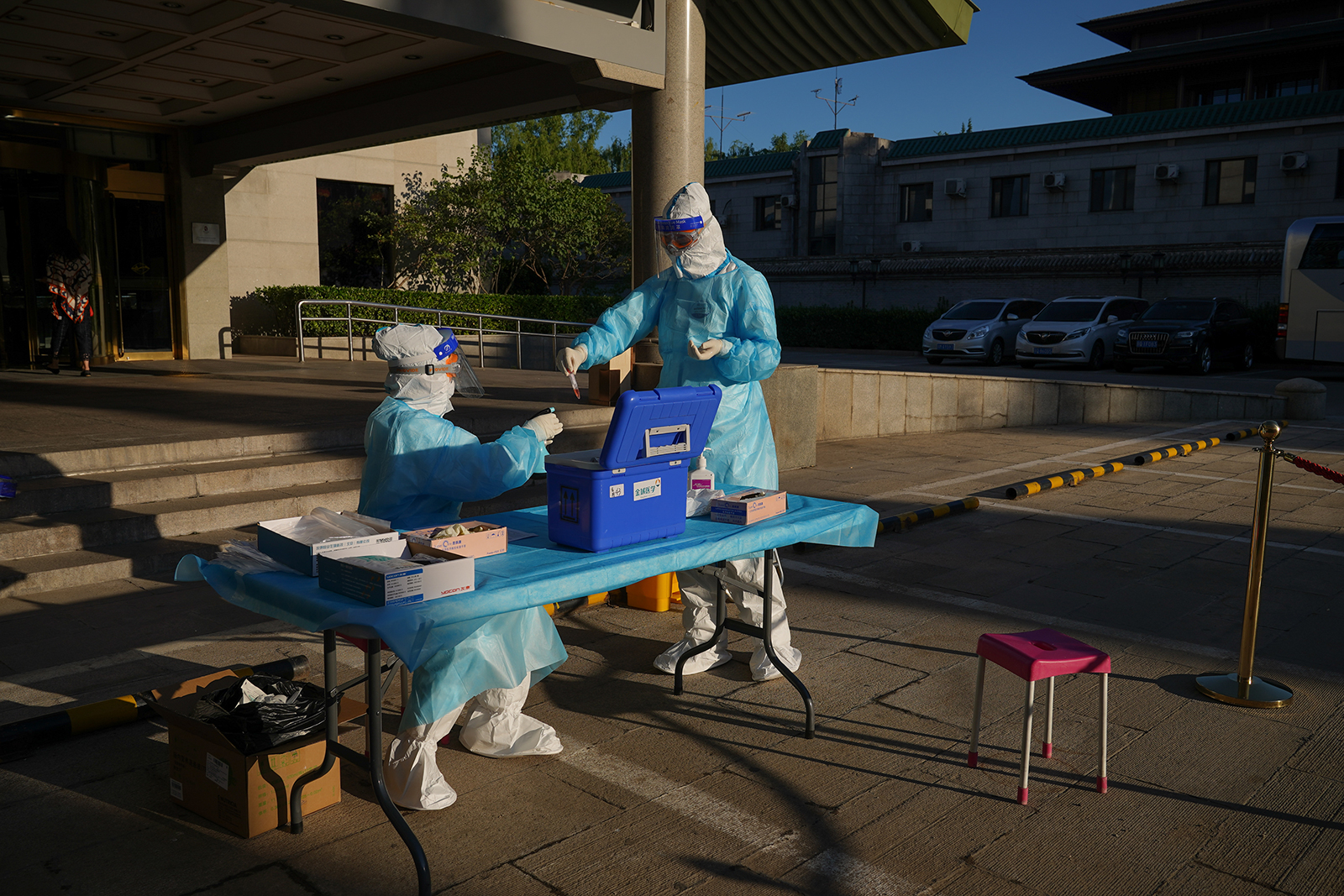 Medical staff prepare to carry out Covid-19 tests on journalists on May 27, at a hotel in Beijing, China.