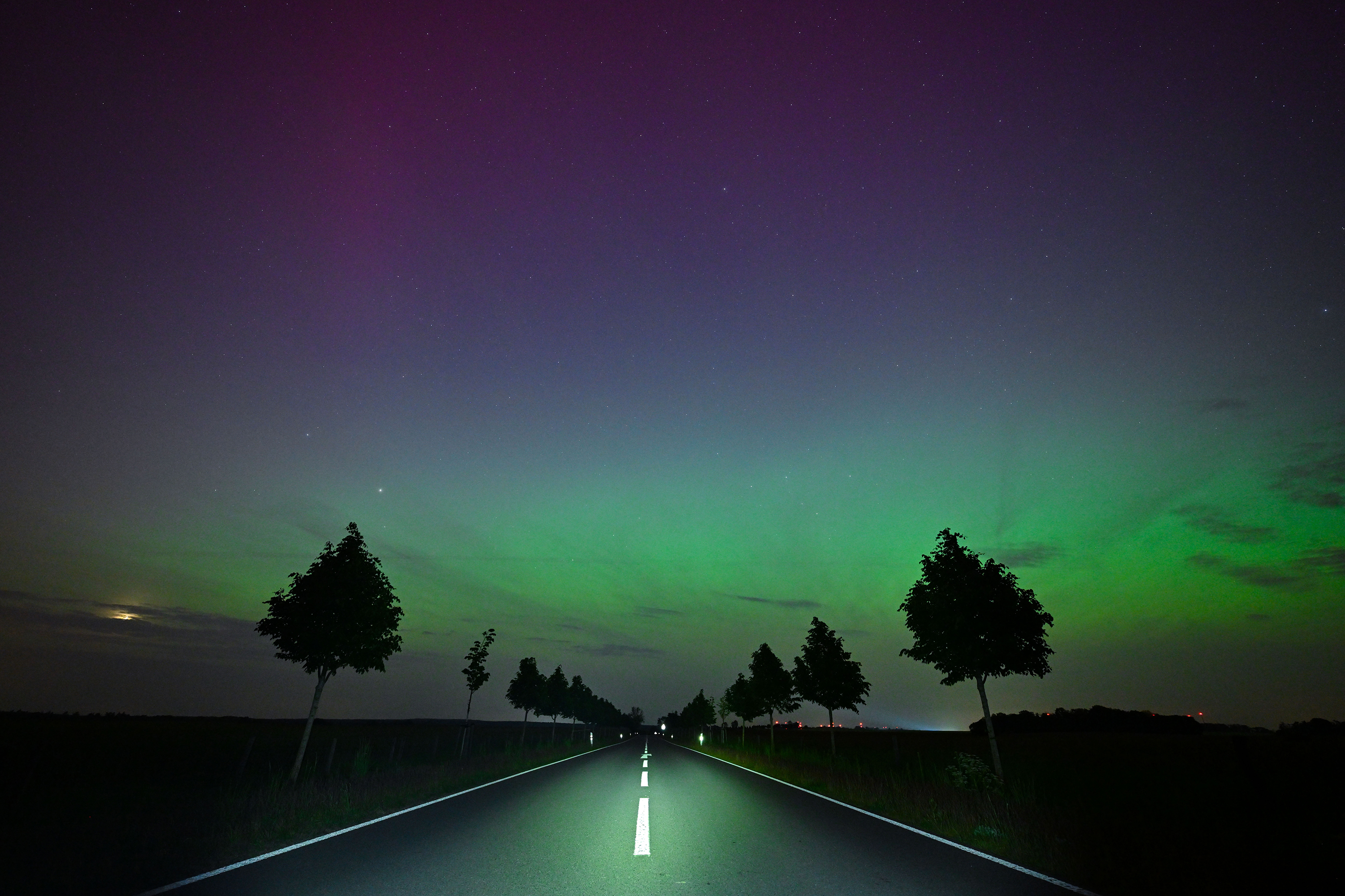 The northern lights glow in the night sky in Brandenburg, Germany, on May 10.