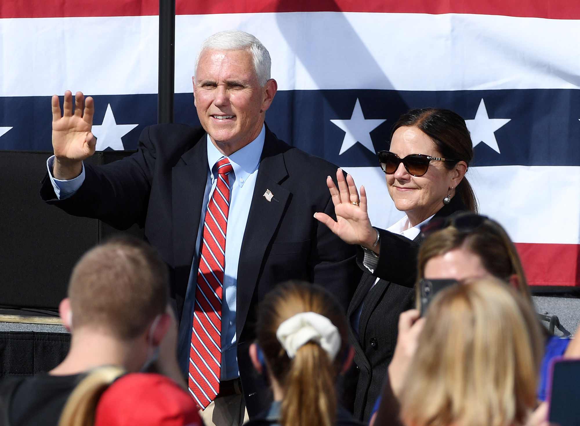 U.S. Vice President Mike Pence (L) and second lady Karen Pence greet supporters after speaking at a rally at the Boulder City Airport on October 8, 2020 in Boulder City, Nevada. 