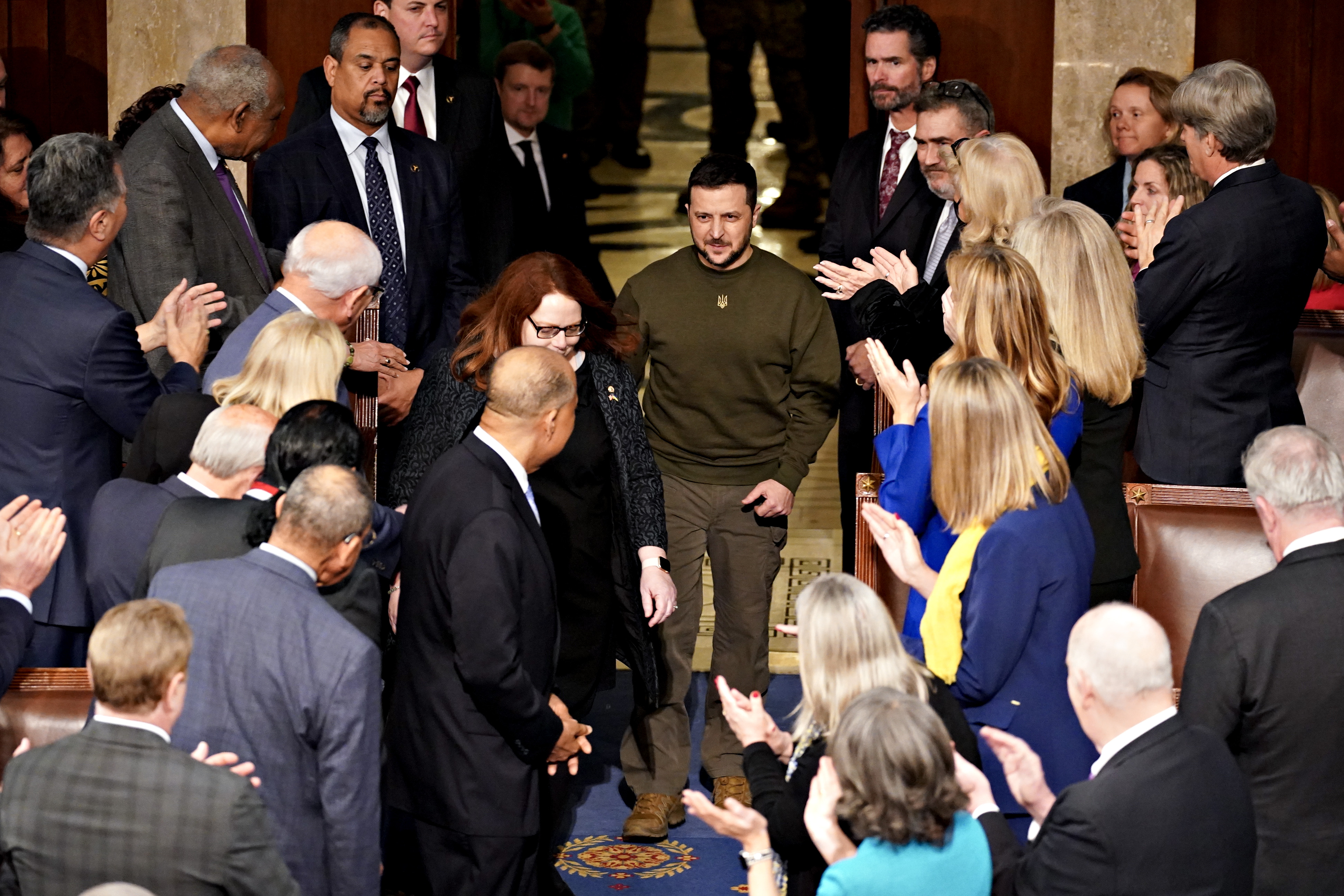 Volodymyr Zelensky, center, arrives to speak during a joint meeting of Congress at the US Capitol in Washington, DC on Wednesday.
