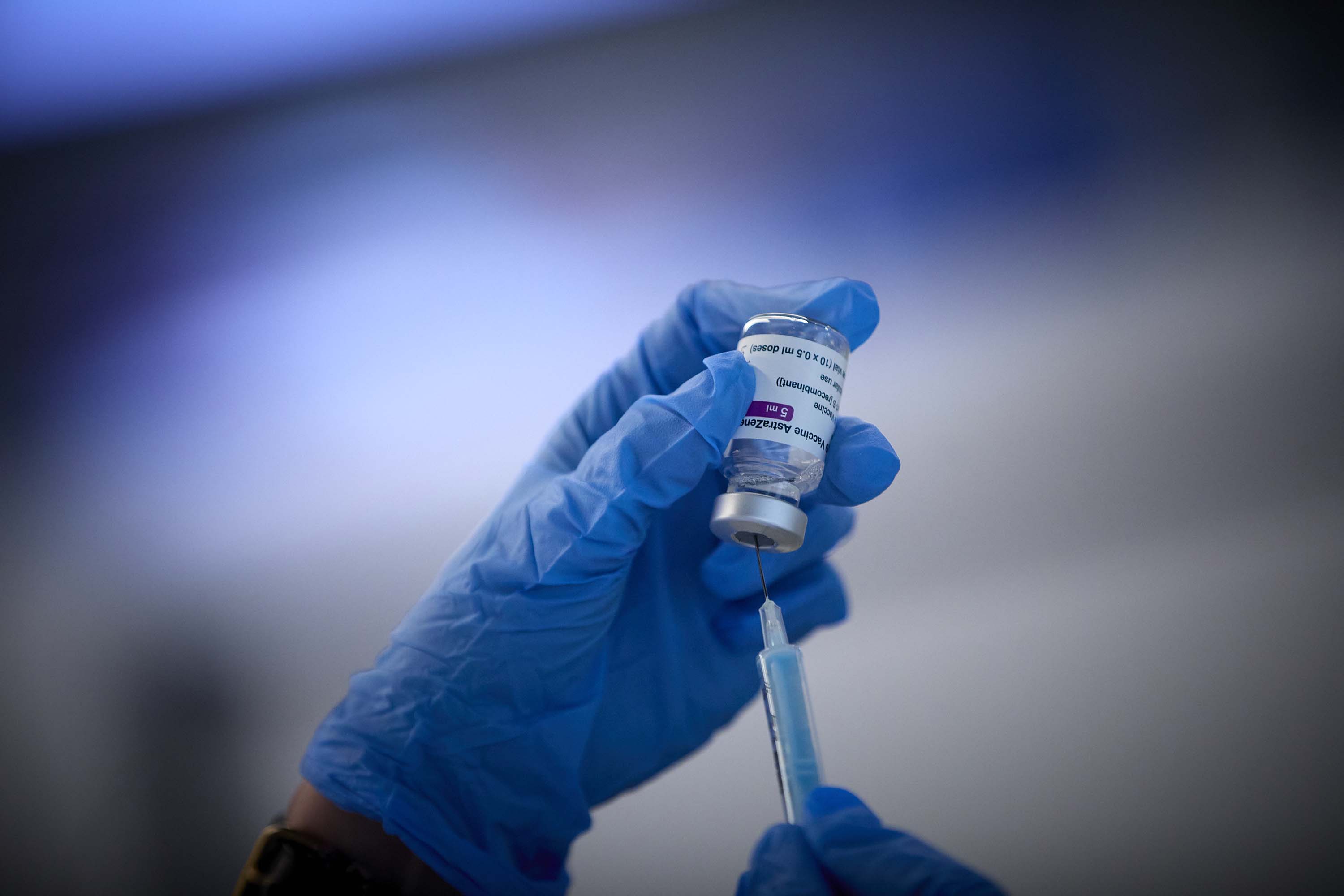 A medic prepares a vaccine at a vaccination site in Madrid, Spain, on April 16. 