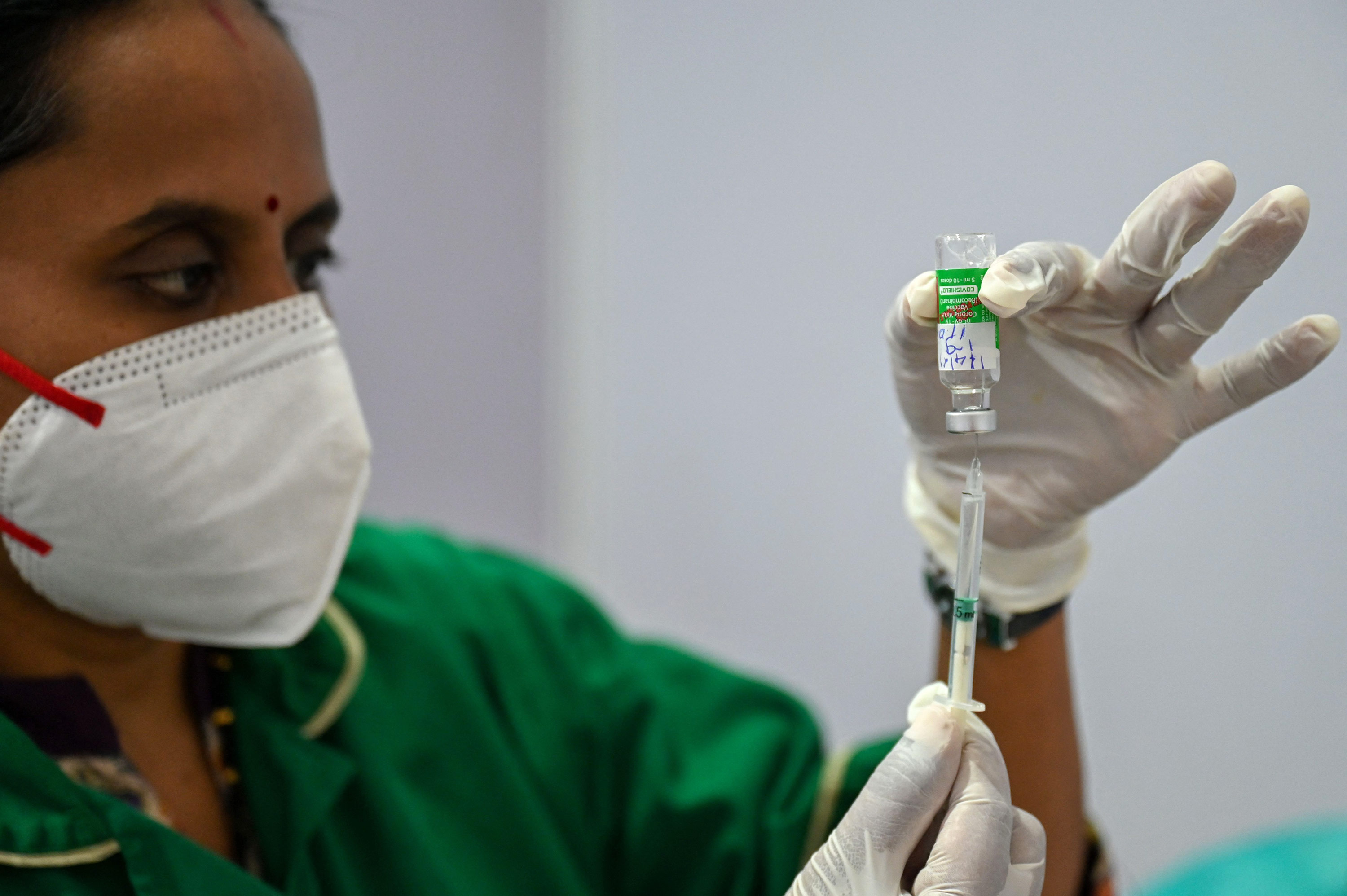 A health worker prepares a dose of the Covishield Covid-19 vaccine in Mumbai, India on April 1. 