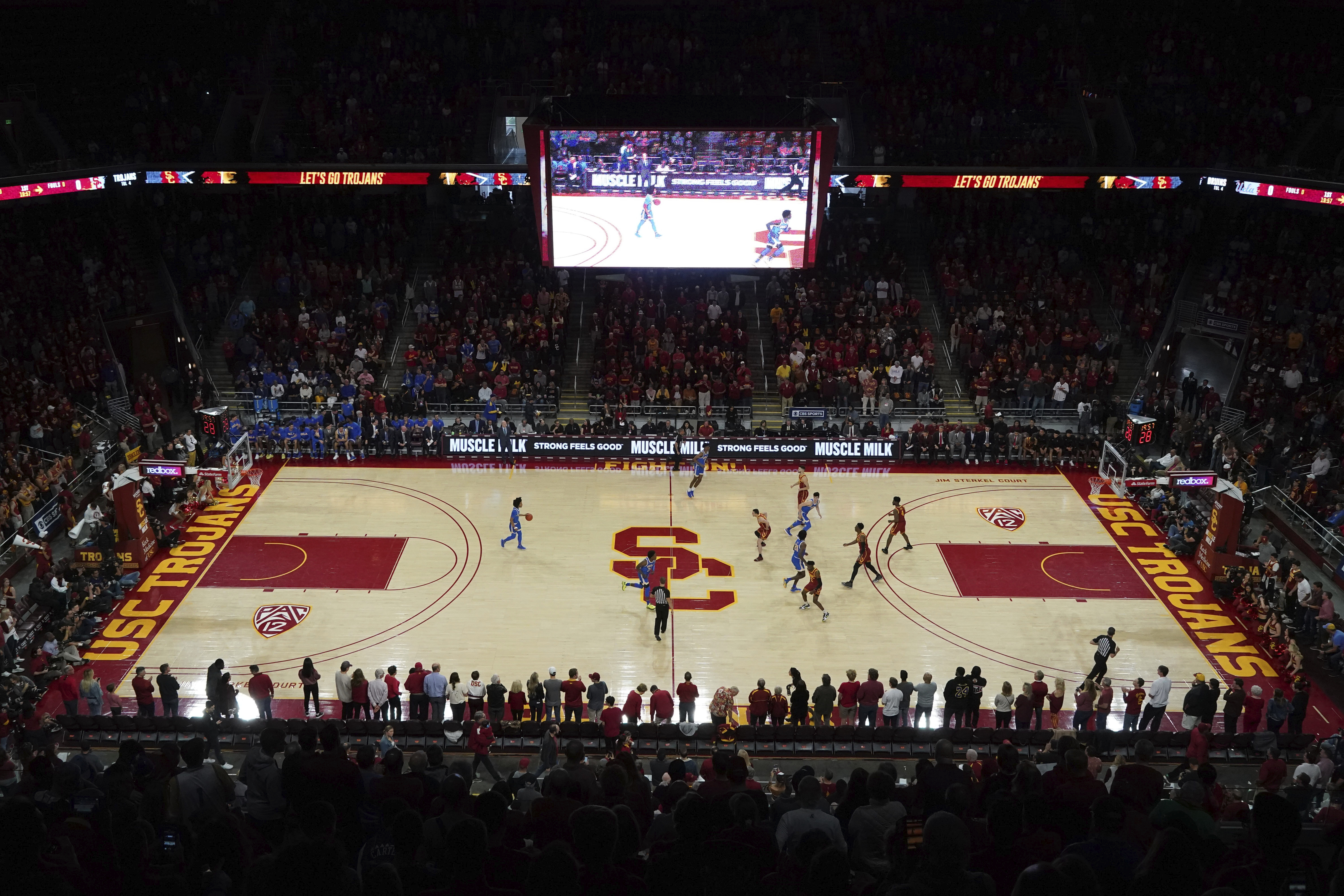 The University of Southern California Trojans and the UCLA Bruins play an NCAA basketball game in Los Angeles on March 7.