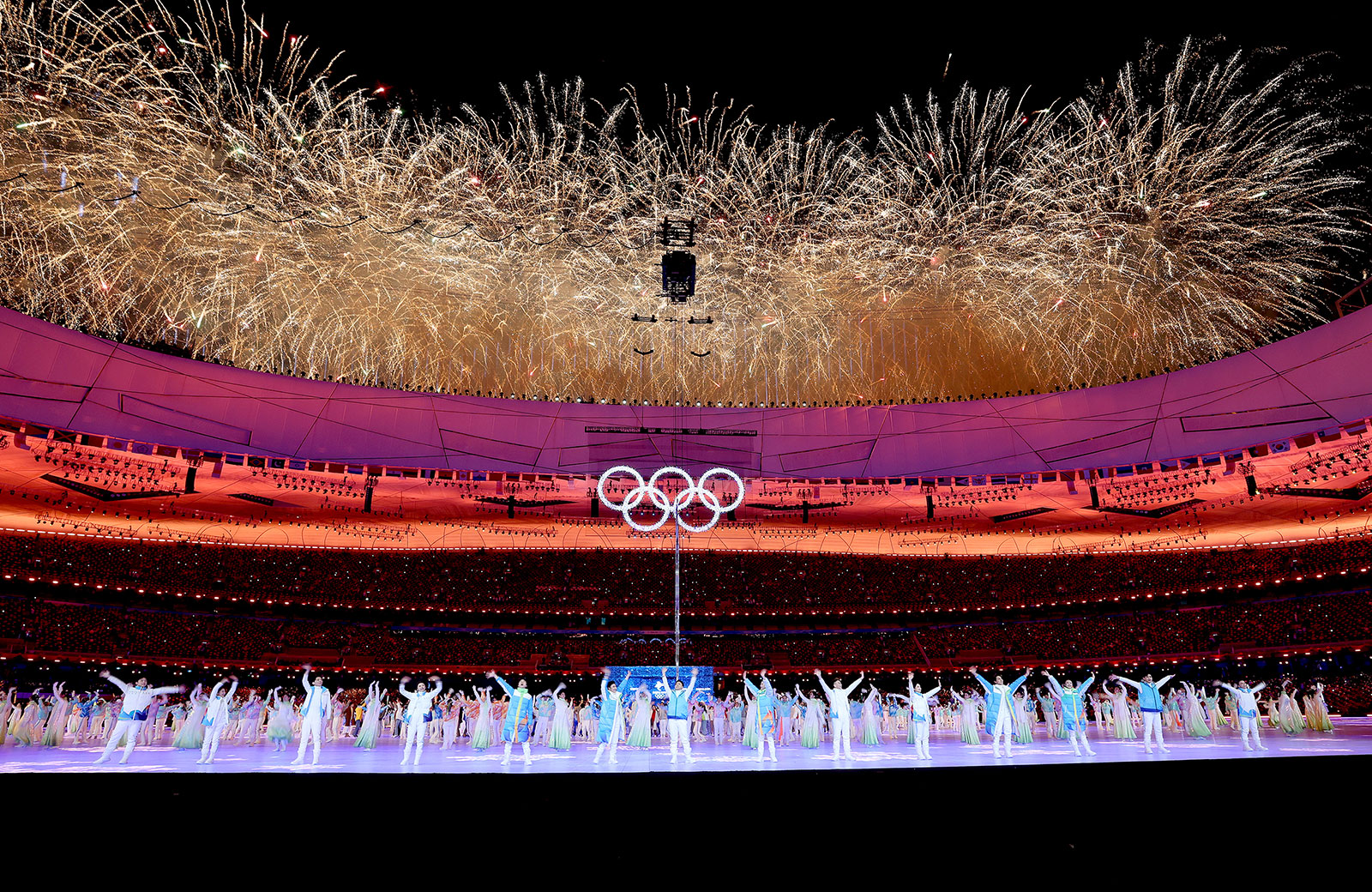 Fireworks explode over Beijing National Stadium during the Closing Ceremony.