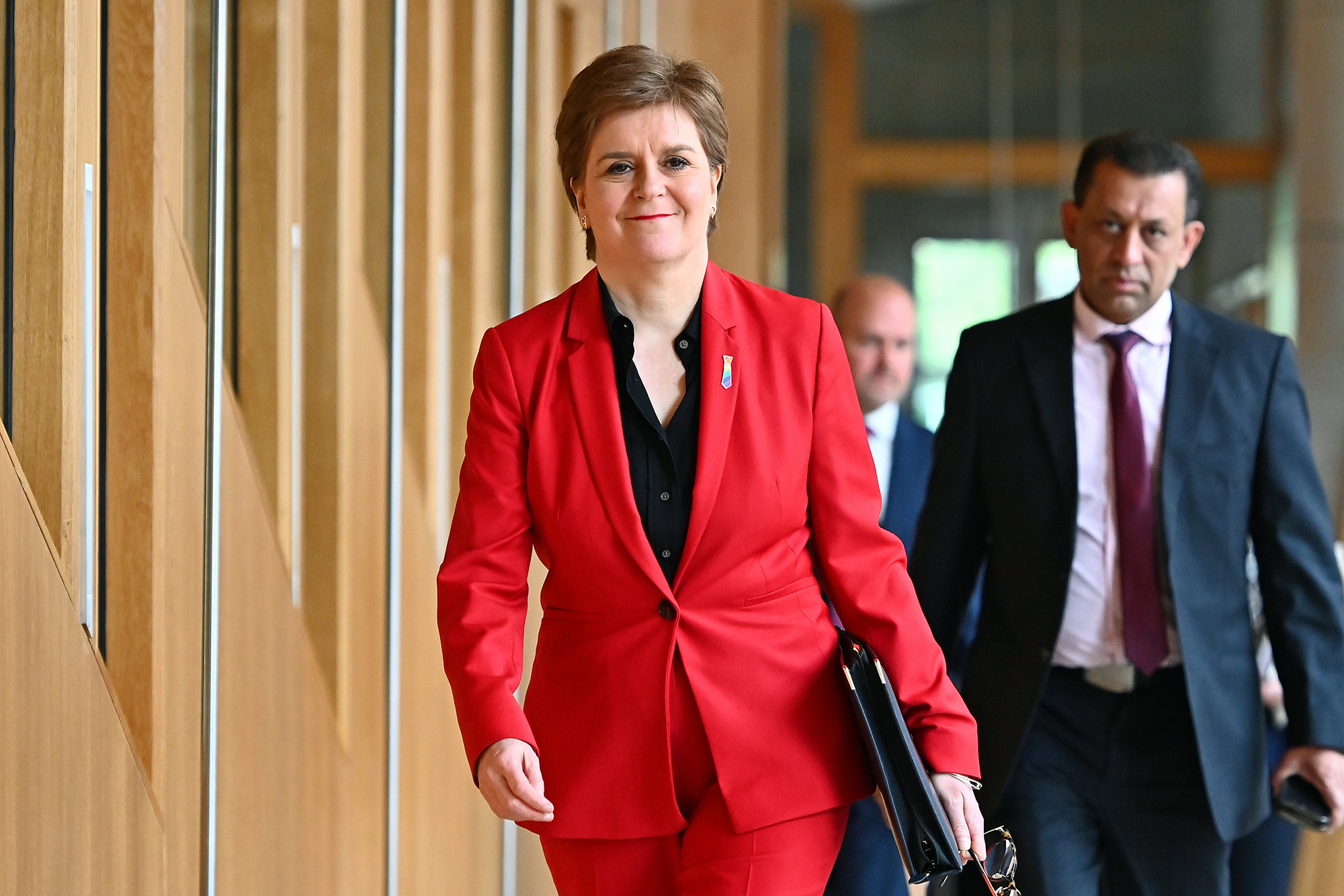 Nicola Sturgeon, center, on the way to First Minister's Questions in the Scottish Parliament, on June 30, in Edinburgh, Scotland.