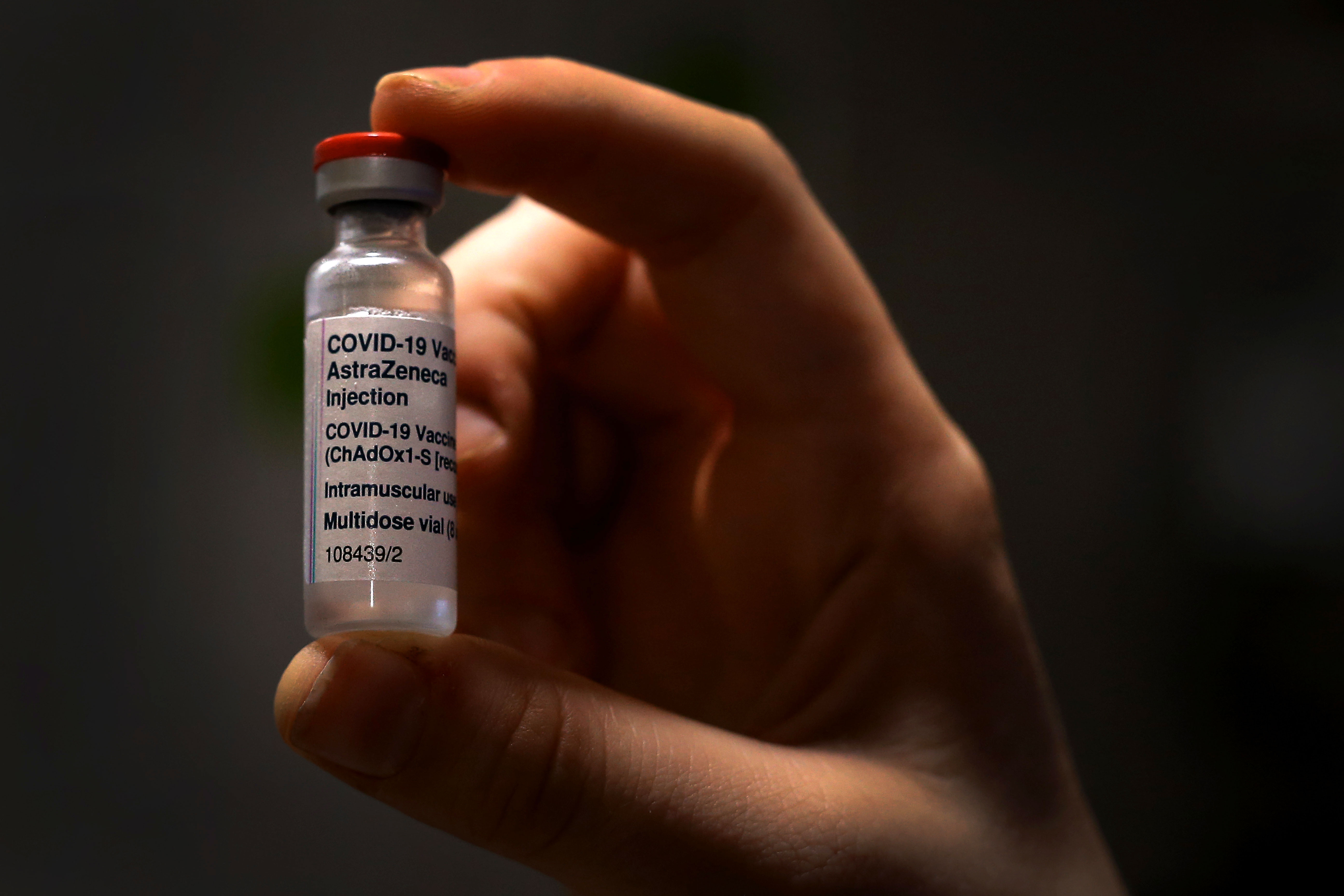 A nurse holds an AstraZeneca Covid-19 vaccine vial on March 23 in Sydney.