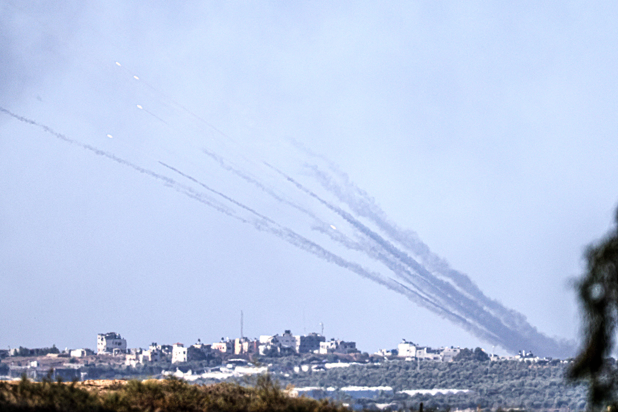 A picture taken from Israel's southern city of Sderot shows rockets fired from northern Gaza towards Israel on October 30.