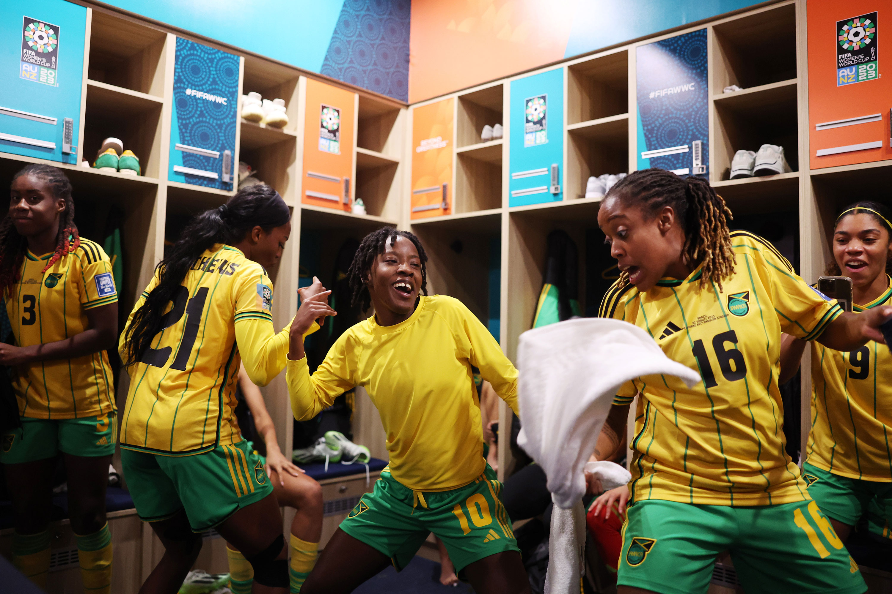 Team Jamaica celebrates in the locker room after they defeated Brazil to advance to the knockouts of the Women's World Cup in Melbourne, Australia, on Wednesday.