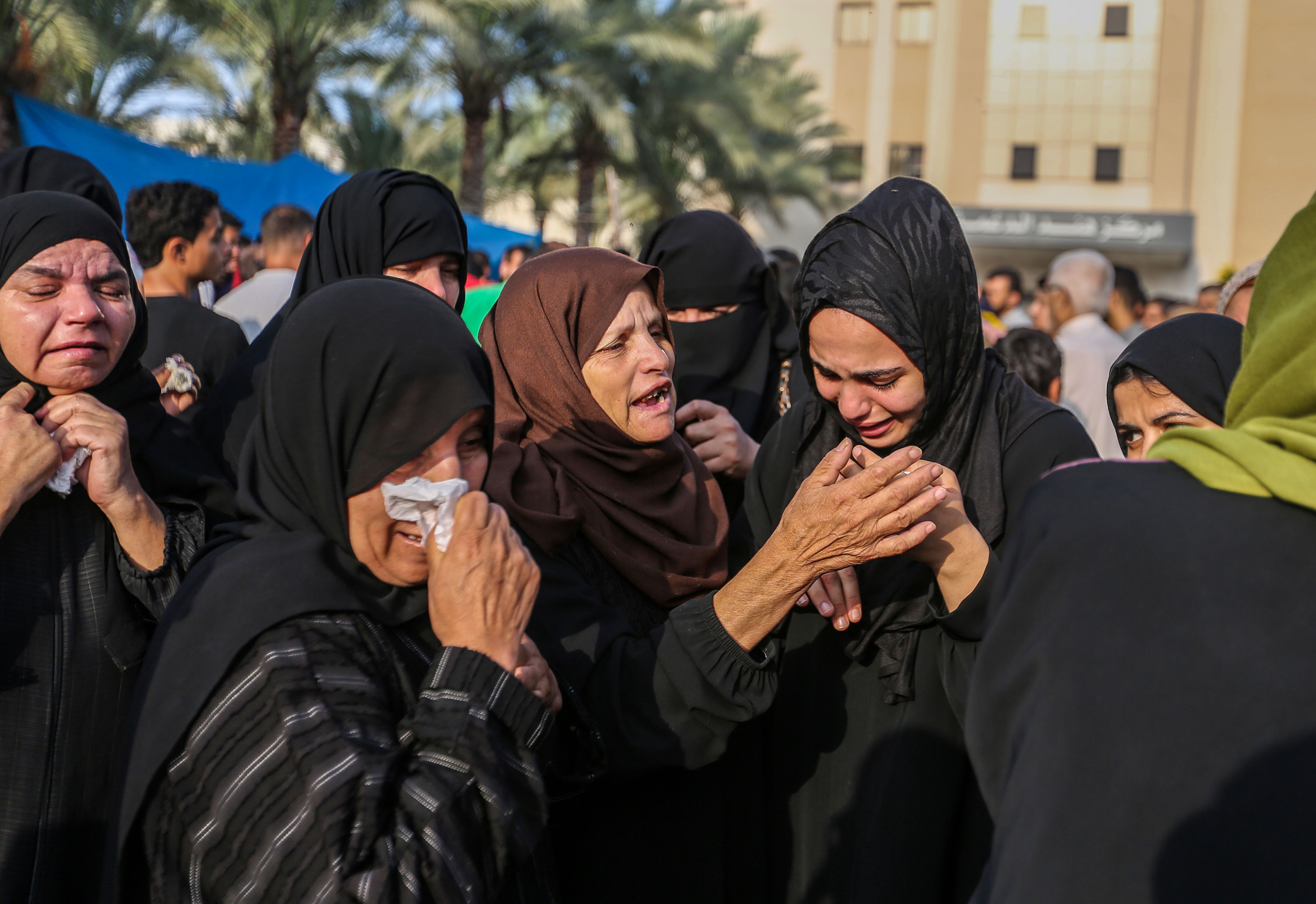 People mourn for Palestinians killed in Israeli attacks on November 3, in Khan Younis, Gaza. 