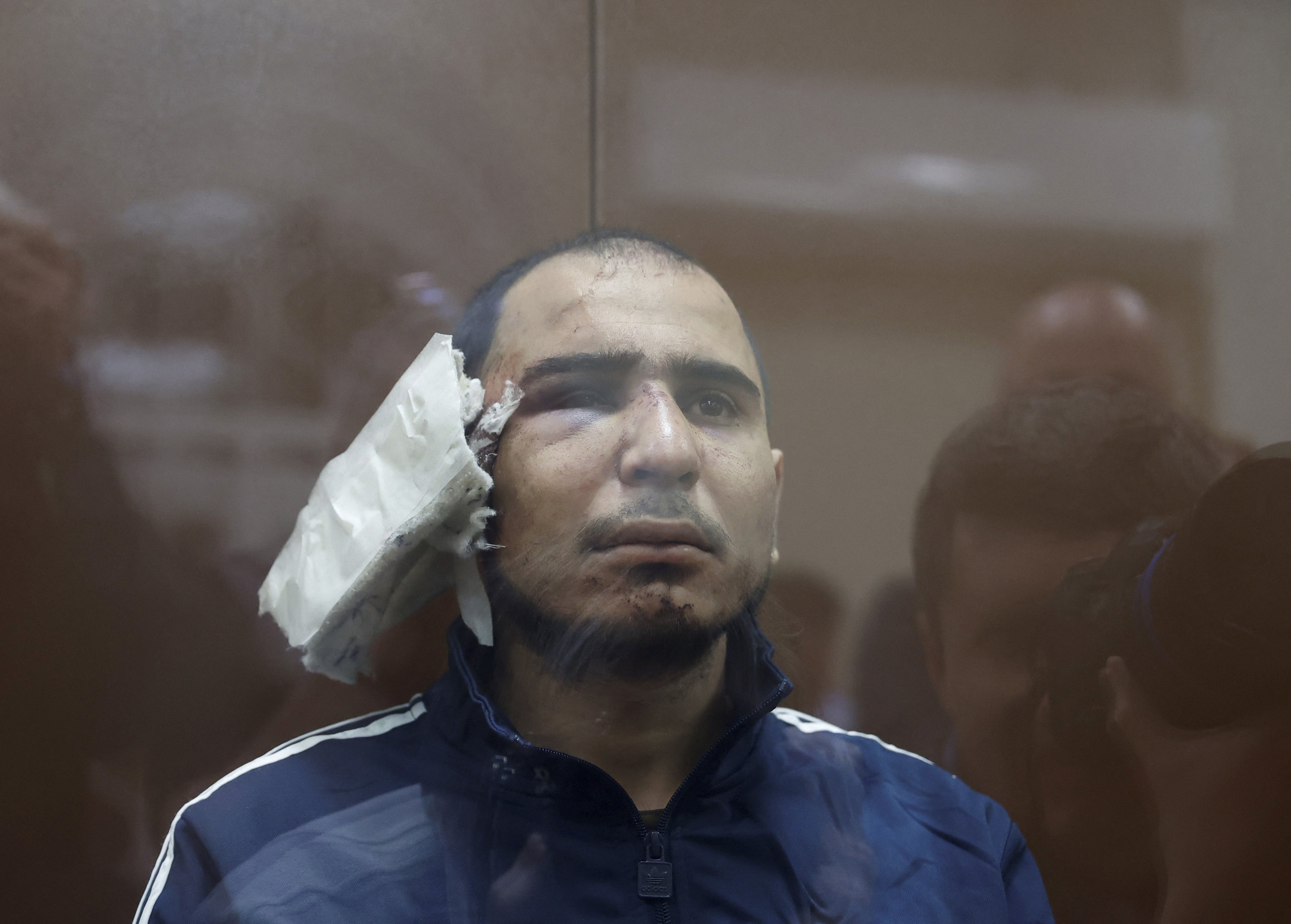 Saidakrami Rachabalizoda, a suspect in the shooting attack at the Crocus City Hall concert venue, appears behind a glass wall of an enclosure for defendants at the Basmanny district court in Moscow, Russia, on March 24. 