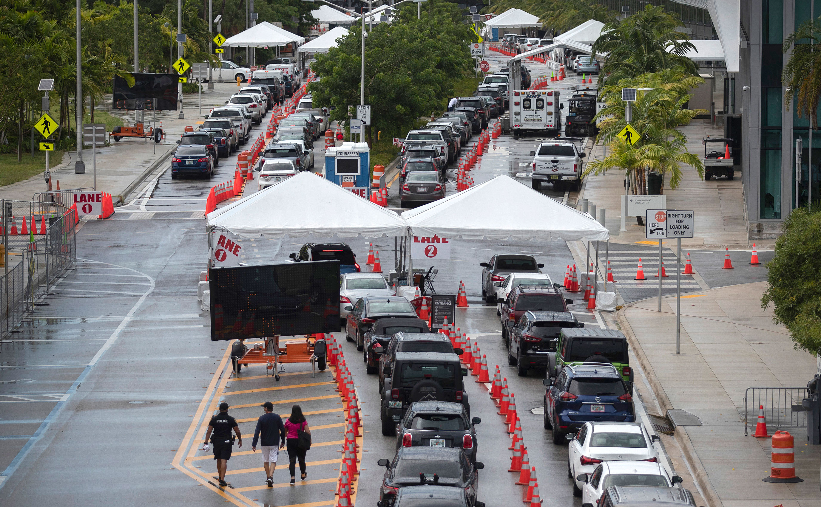 Drivers wait to be tested for Covid-19 at a testing site on July 13 in Miami Beach, Florida. 