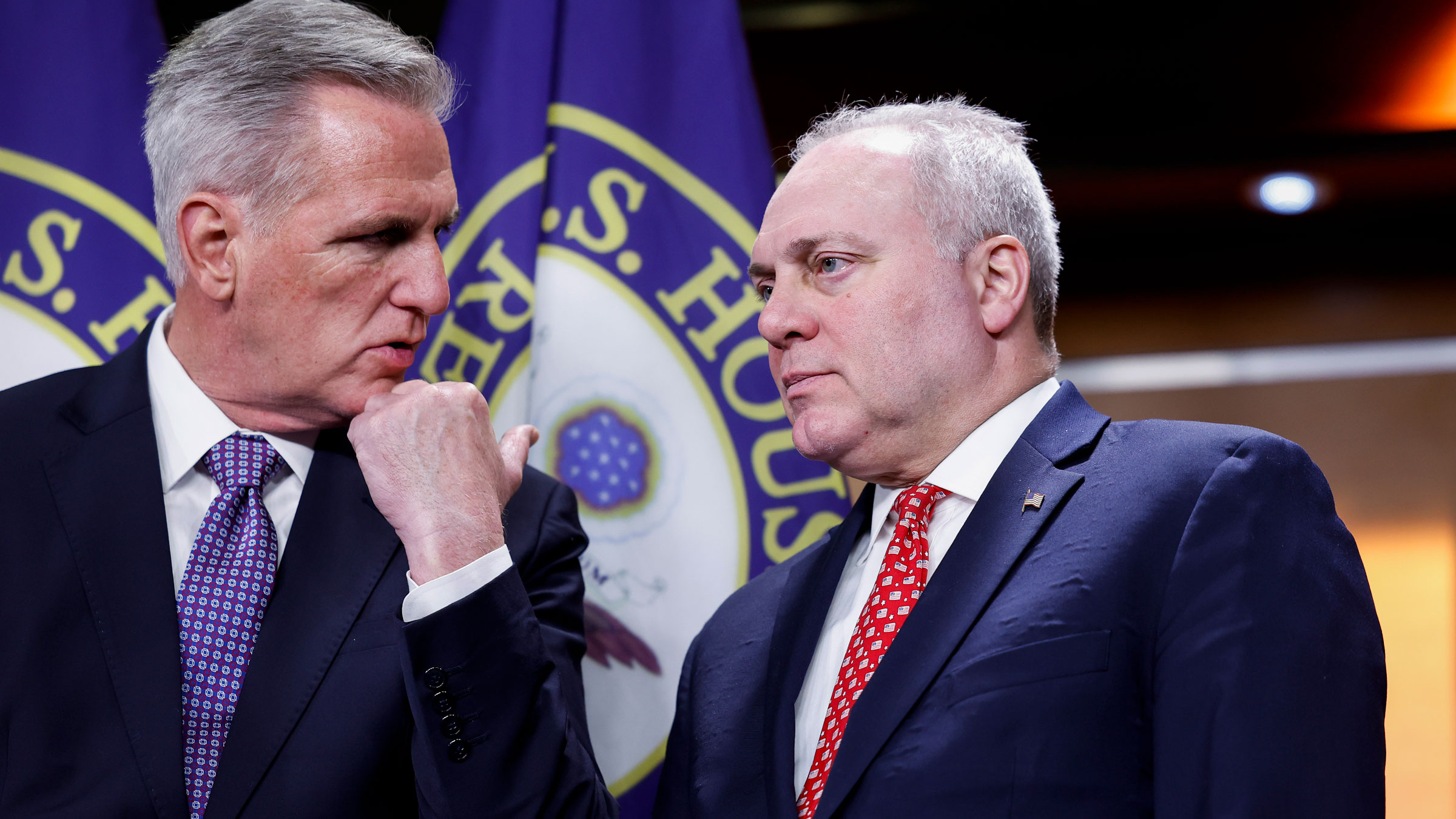 House Minority Leader Kevin McCarthy, left, speaks with House Minority Whip Steve Scalise during a news conference on December 14.