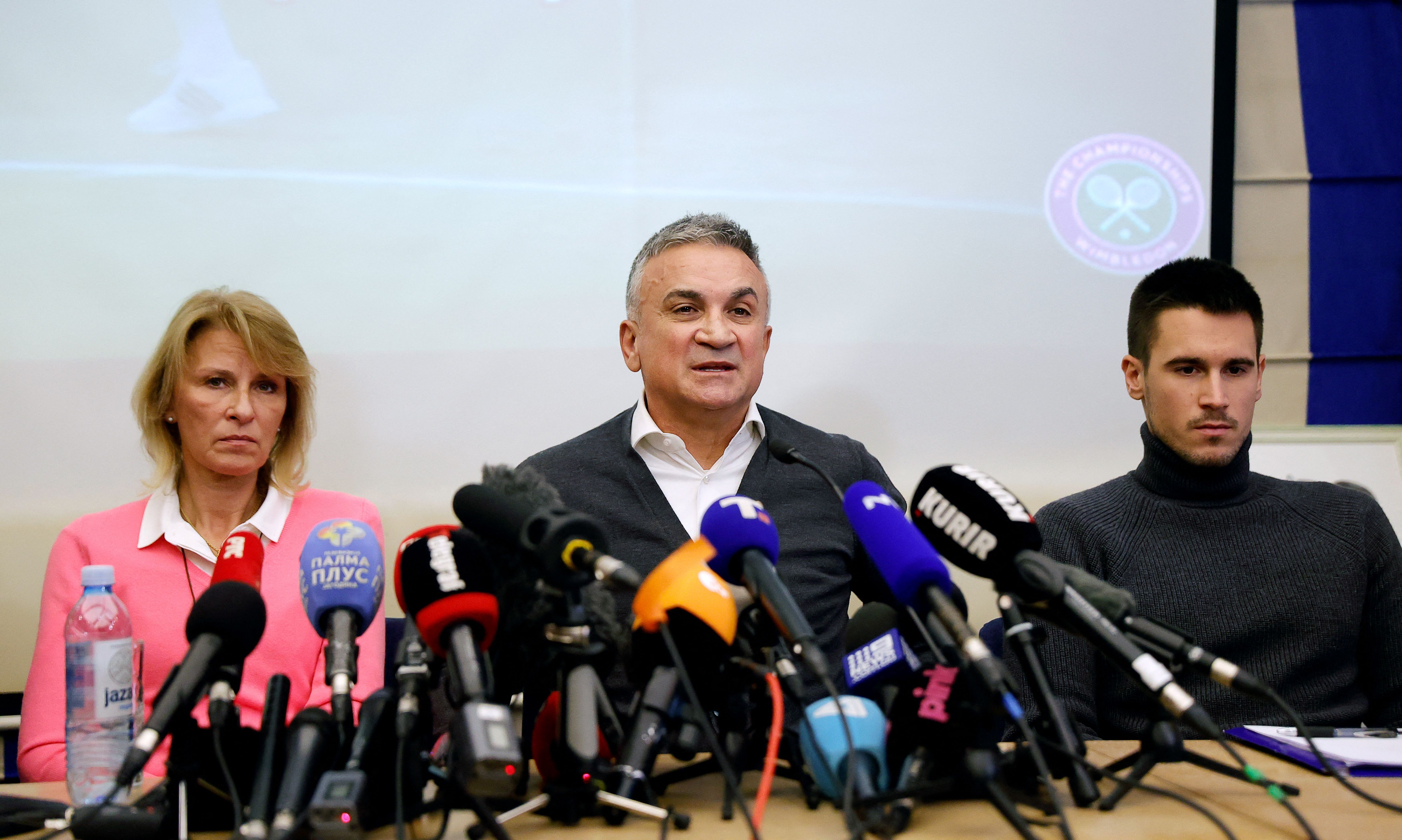 From left to right, Serbian tennis player Novak Djokovic's mother Dijana, father Srdjan and brother Djordje hold a news conference in Belgrade, on Monday, after a judge in Australia overturned the cancelation of the tennis star's visa.