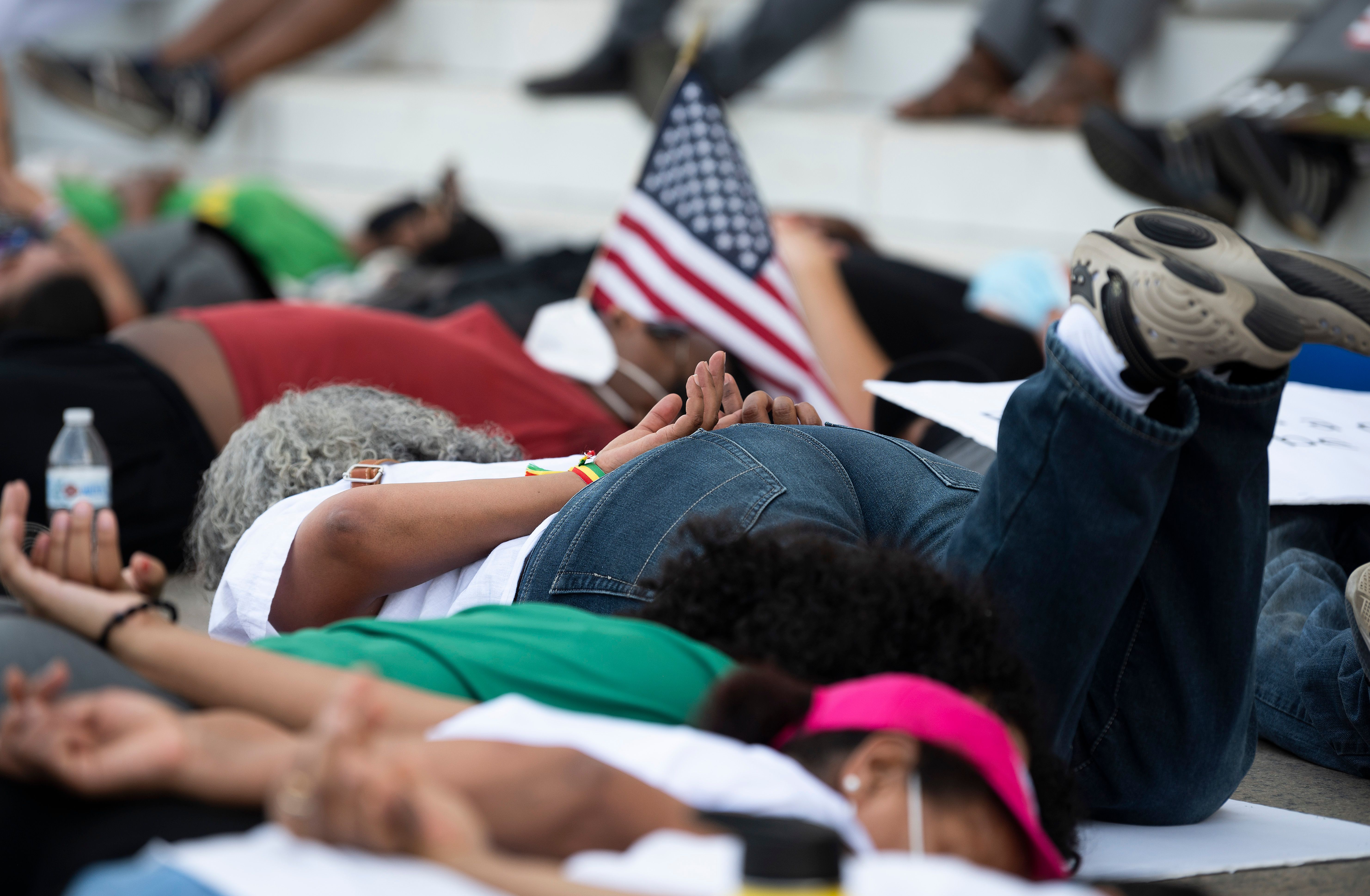 Protesters demonstrate the death of George Floyd at the Lincoln Memorial on June 9 in Washington, DC.