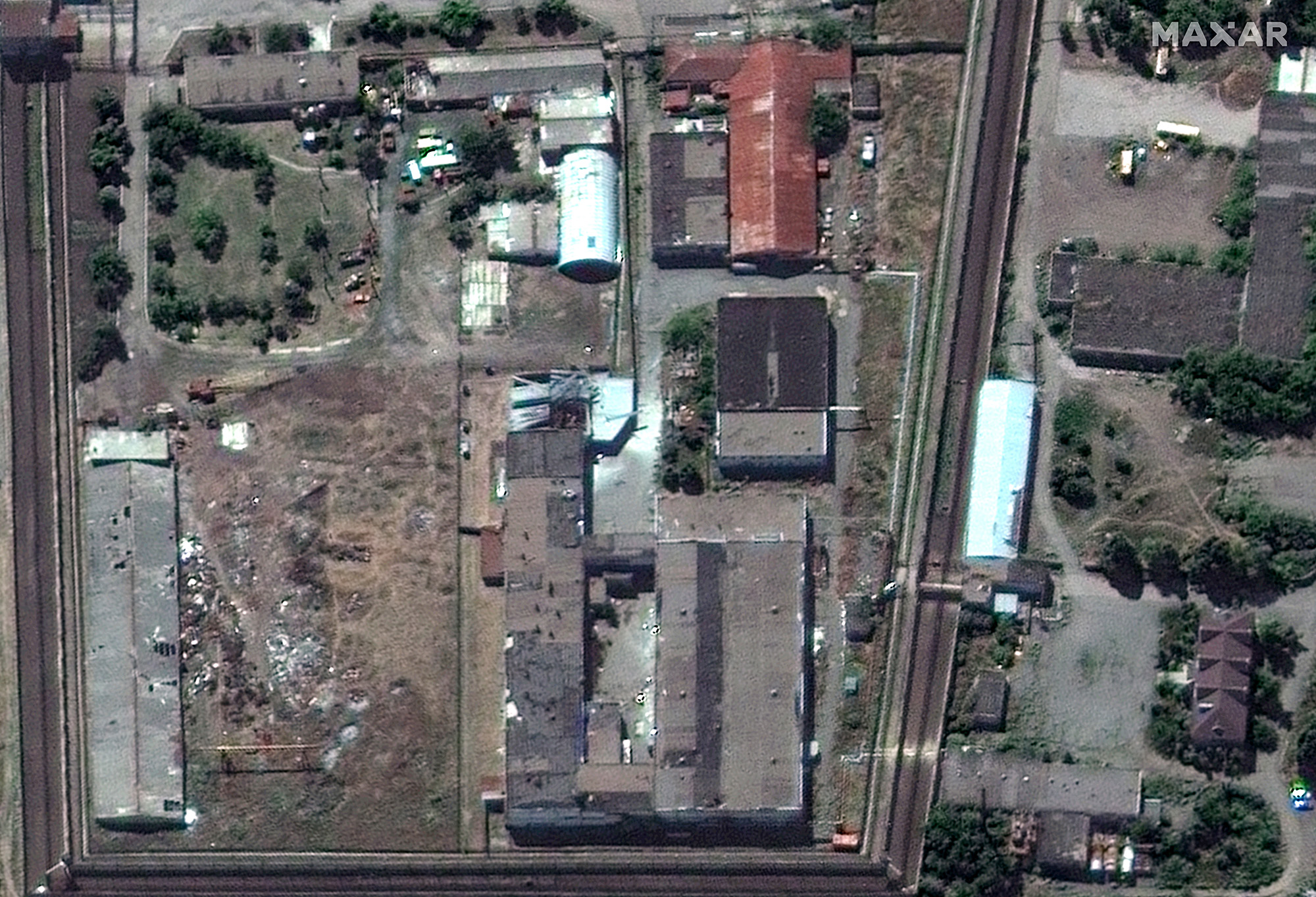 Olenivka-gevangenis in Donetsk te zien op een satellietfoto van Maxar Technologies op 30 juli, na de aanval op de faciliteit.