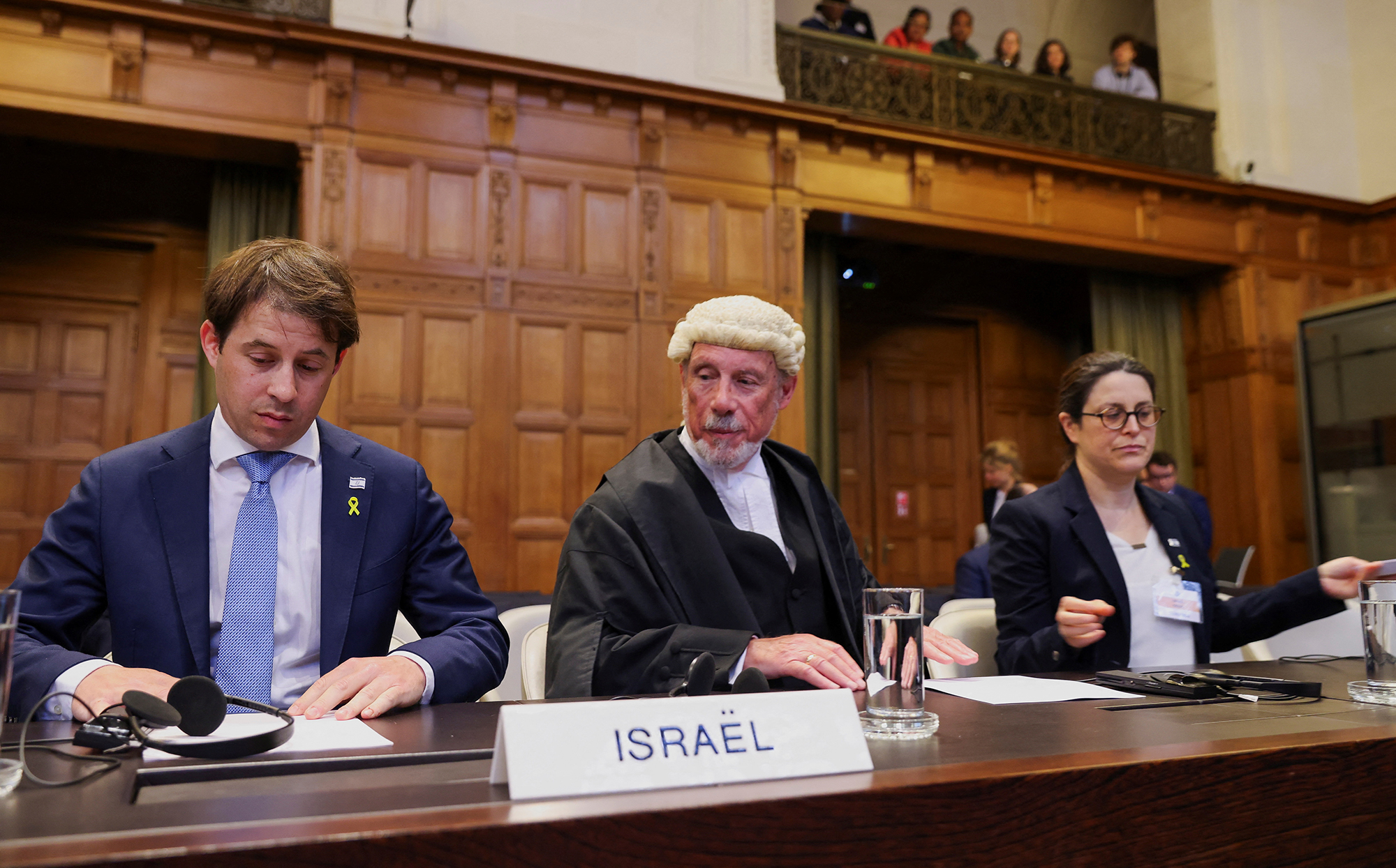 British jurist Malcolm Shaw, center, and Yaron Wax, left, look on at the International Court of Justice during the case brought before the Hague-based court by South Africa accusing Israel of genocide, in The Hague, Netherlands, on May 24.