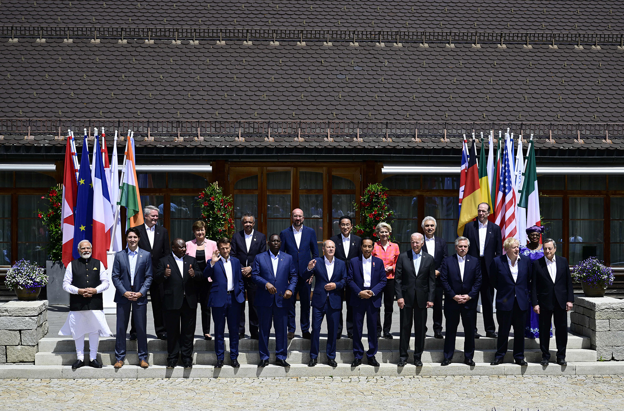 G7-leaders and participants of the outreach program pose for a family photo on June 27, at Elmau Castle, Germany