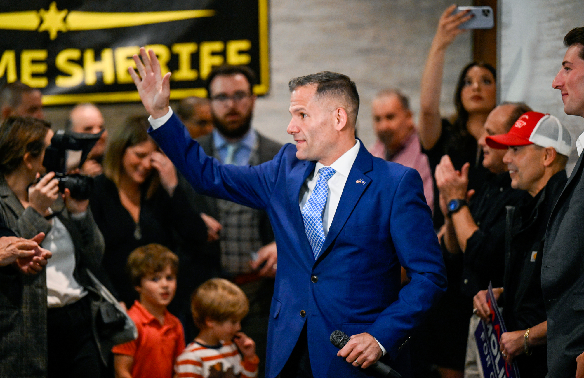 Republican Marc Molinaro waves to supporters on Tuesday at his election headquarters in Binghamton, New York.