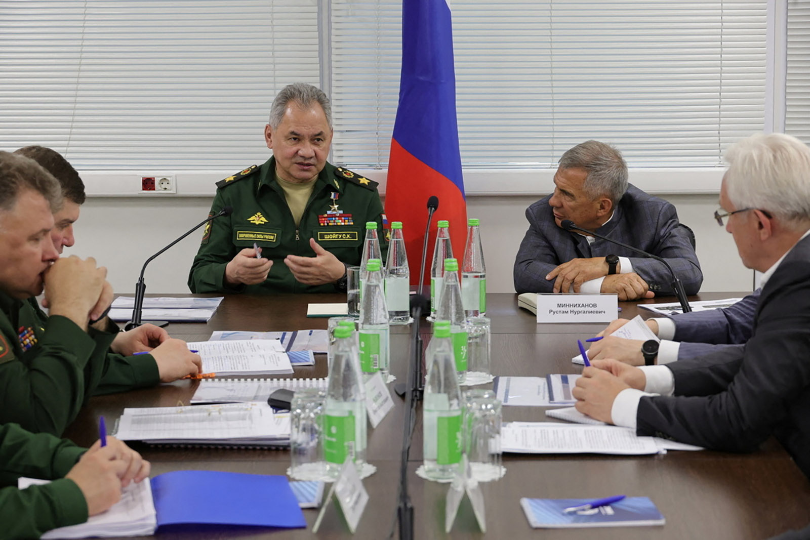 Russian Defence Minister Sergei Shoigu, center, attends a meeting as part of the inspection of defence industry enterprises, in the Republic of Tatarstan, Russia, in an image released on July 11. 