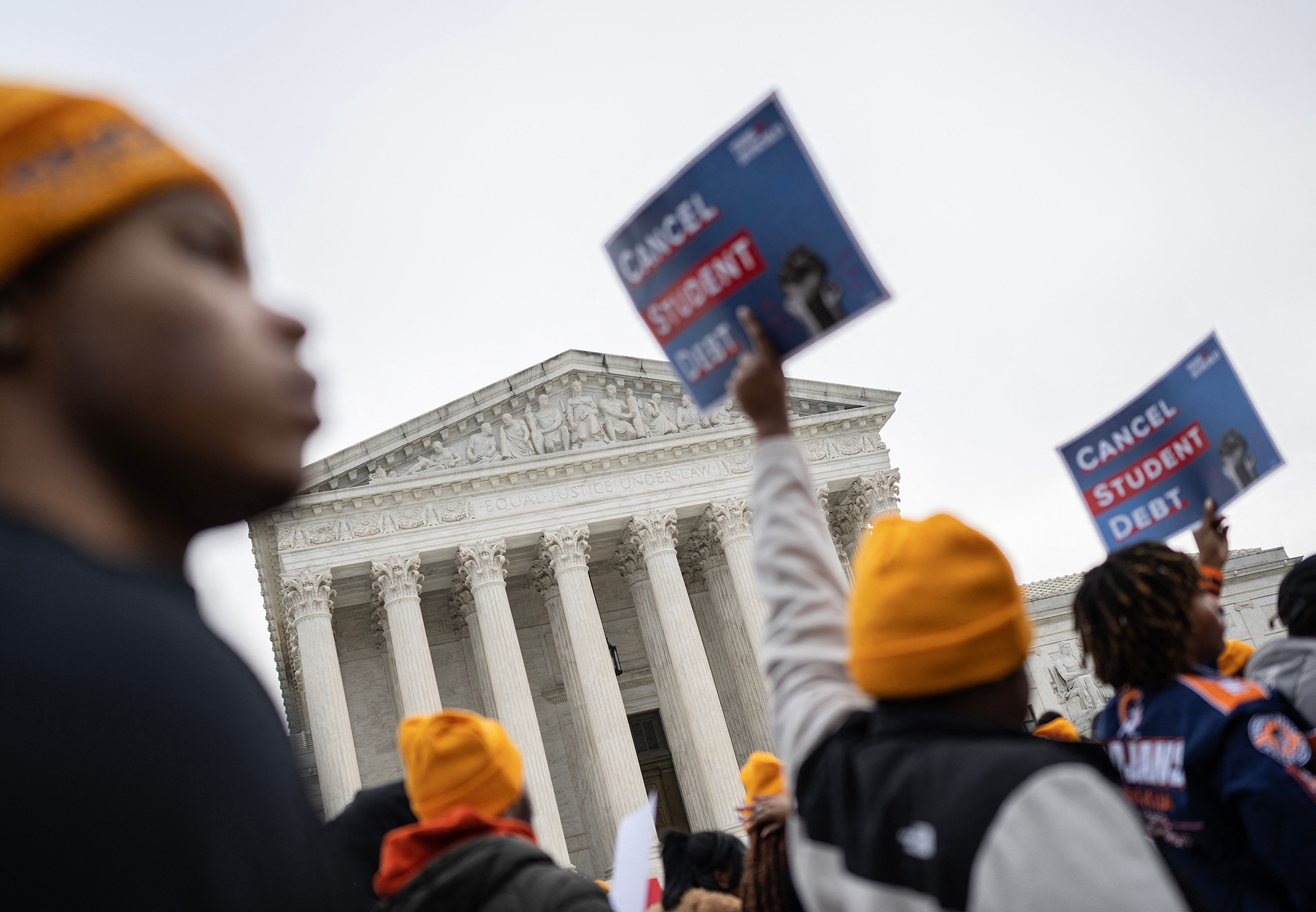 Activists and students protest in front of the Supreme Court during a rally for student debt cancellation in Washington, DC, on February 28.
