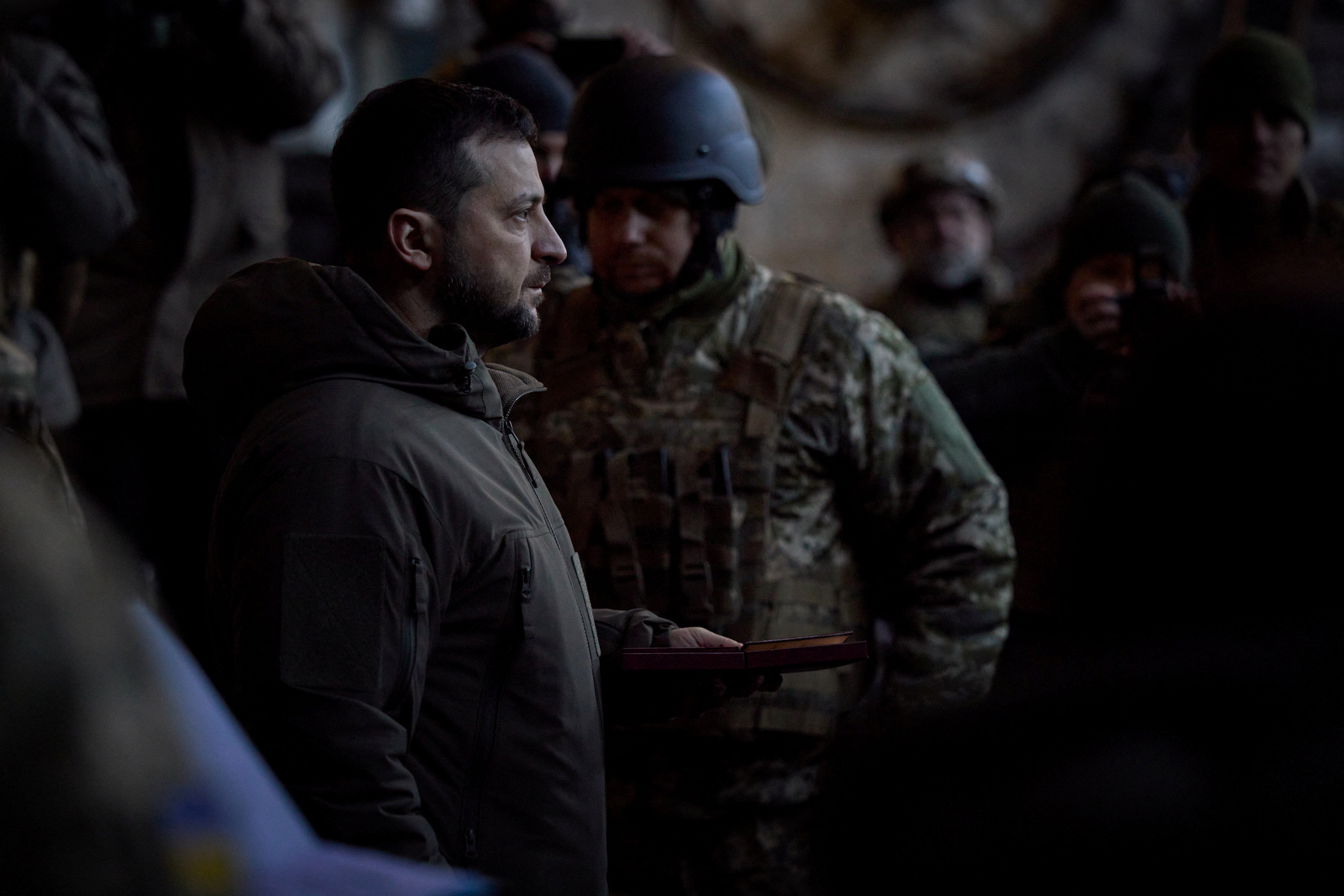 President Volodymyr Zelensky attends an award ceremony on Tuesday for Ukrainian service members at their position in the frontline town of Bakhmut, Donetsk region.