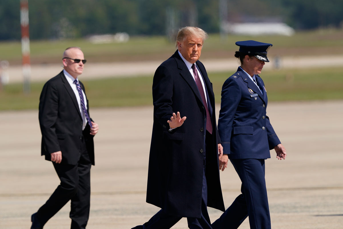 President Donald Trump walks towards Air Force One at Andrews Air Force Base on October 1, where he is headed to a scheduled fundraiser at his golf club in Bedminster, New Jersey. 