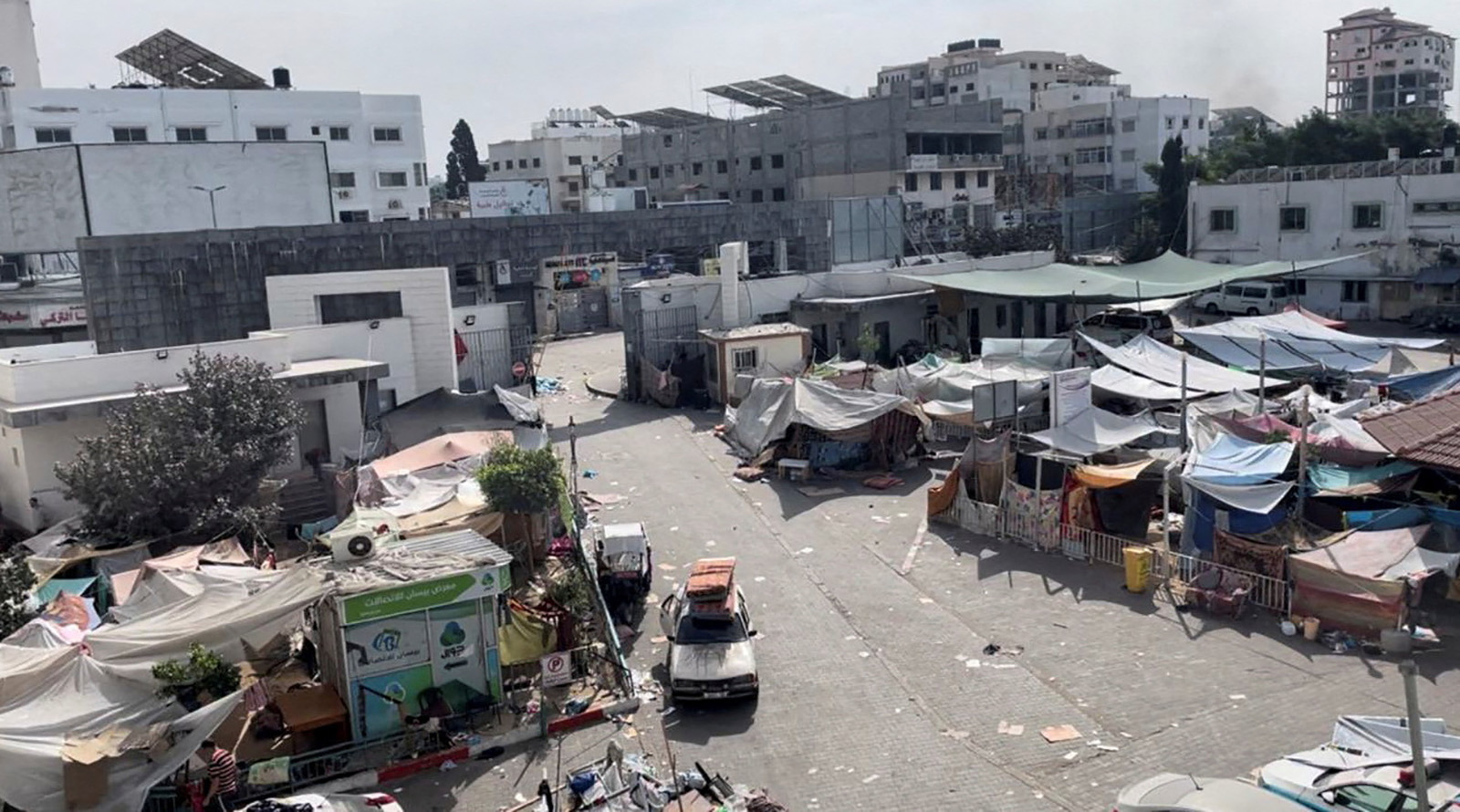 Tents and shelters used by displaced Palestinians stand at the yard of Al Shifa hospital during the Israeli ground operation around the hospital, in Gaza City, on November 12.
