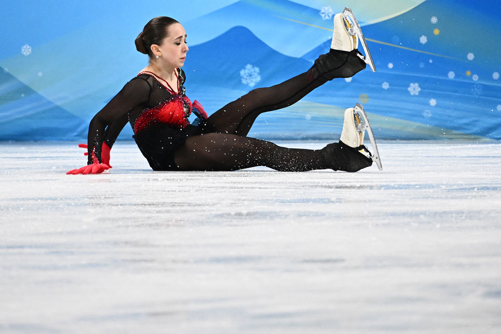Figure skater Kamila Valieva falls during her free skate on Thursday, February 17. Valieva, who has been at the center of a doping controversy at the Beijing Winter Olympics, fell multiple times during her free skate Thursday and finished fourth in the women's singles competition.