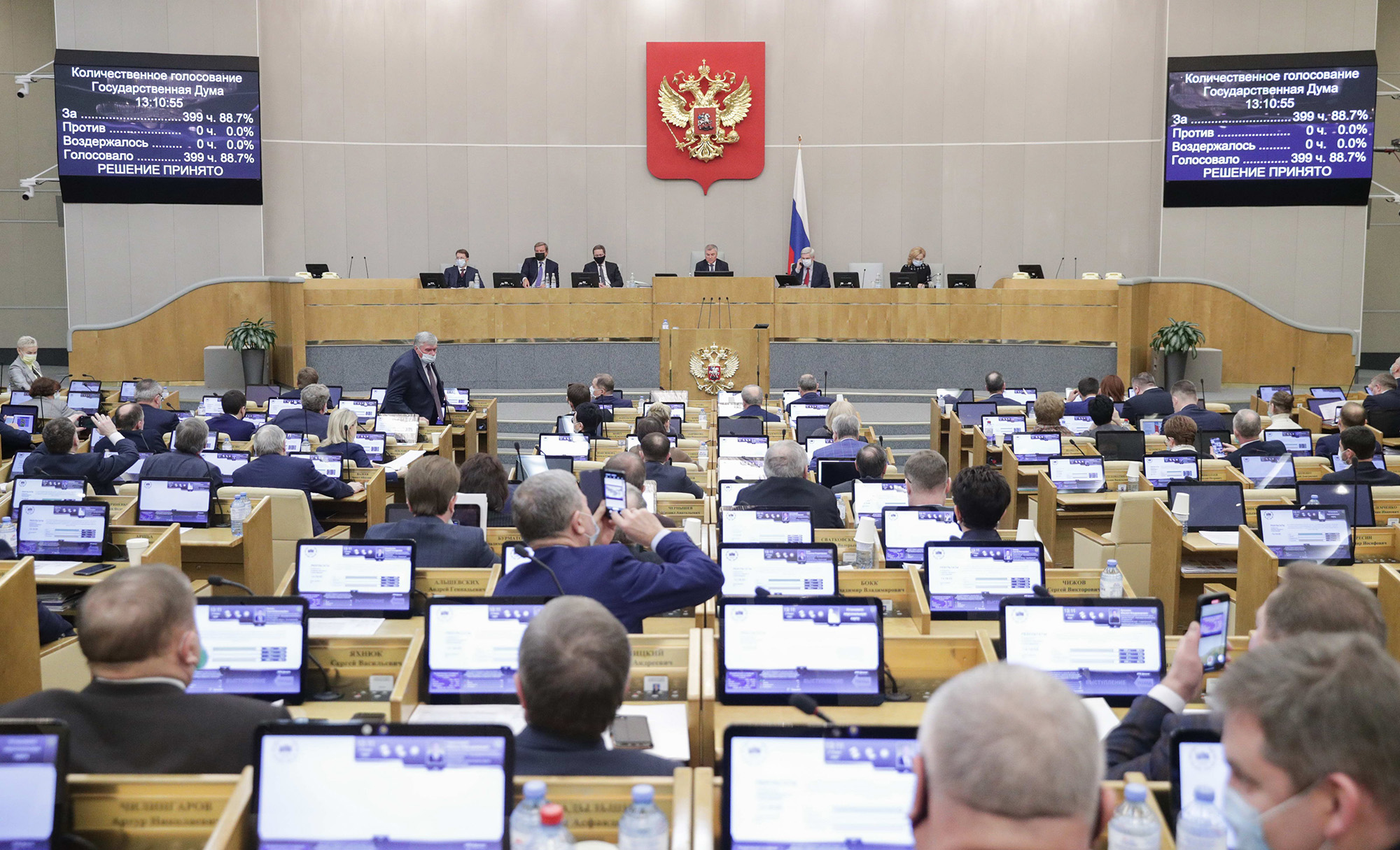 Deputies attend a session at the State Duma, the Lower House of the Russian Parliament in Moscow, Russia, on January 27, 2021. Both houses of parliament voted unanimously to extend a new START treaty for five years, a fast-track move that comes days before the last remaining U.S.-Russian arms control pact is due to expire. 