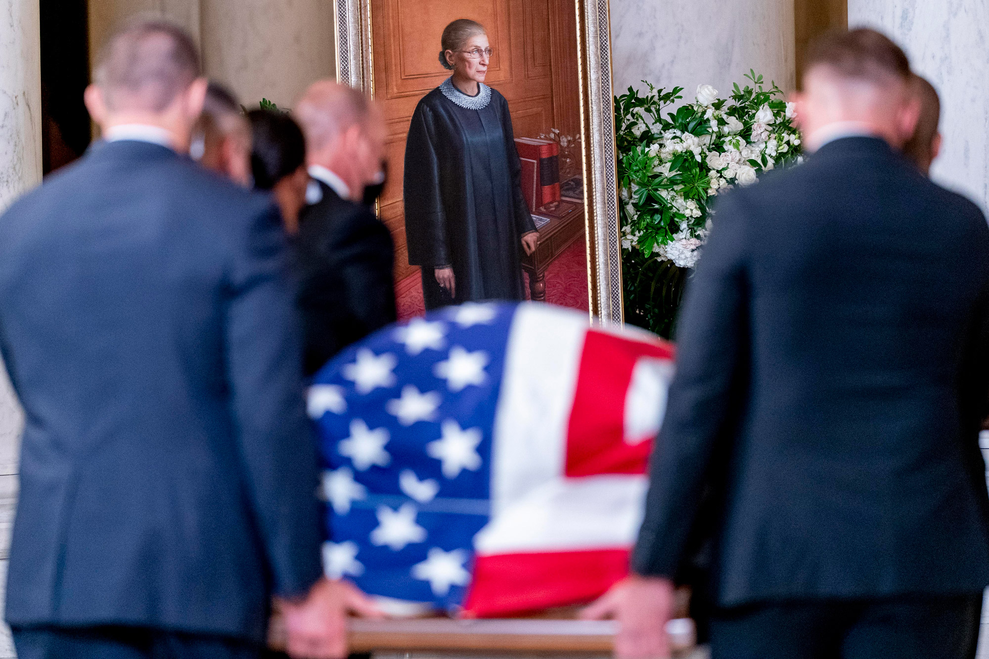 The flag-draped casket of Associate Justice Ruth Bader Ginsburg arrives in the Great Hall at the U.S. Supreme Court, on September 23 in Washington, DC. 