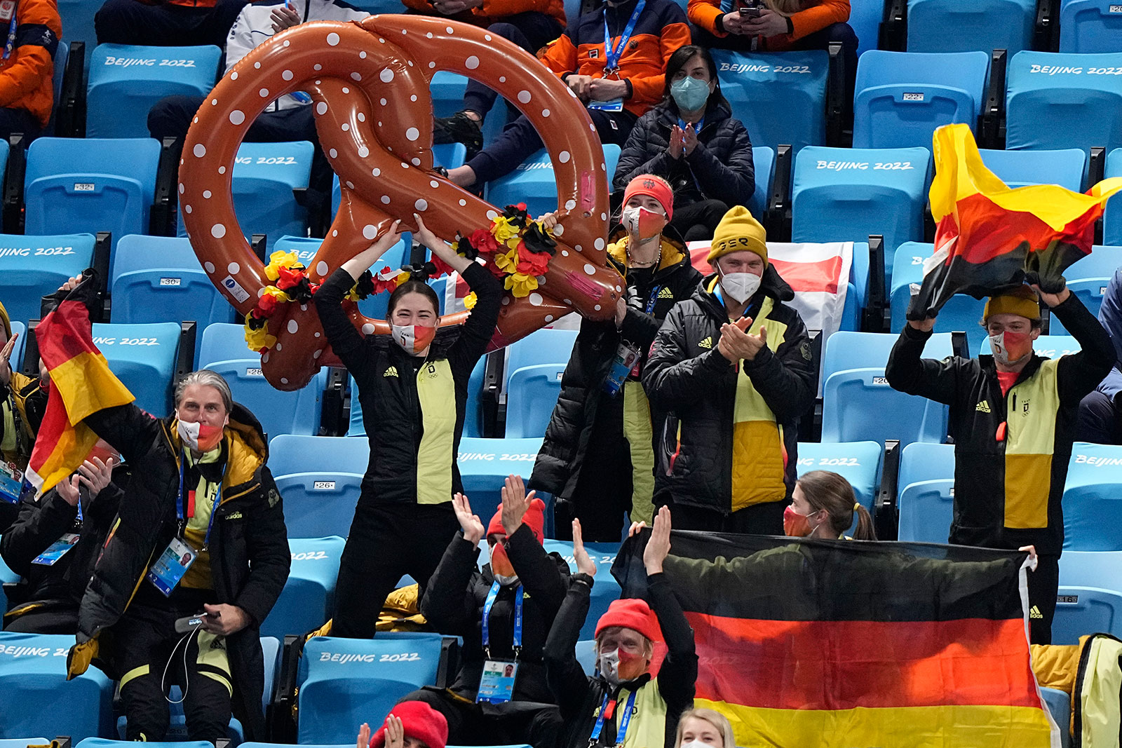 Just some German fans cheering on Nicole Schott with a giant pretzel. Nothing to see here.