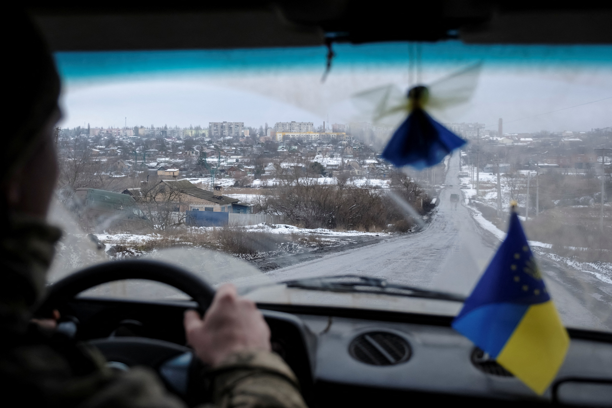 A Ukrainian serviceman drives a car in Bakhmut on February 2.