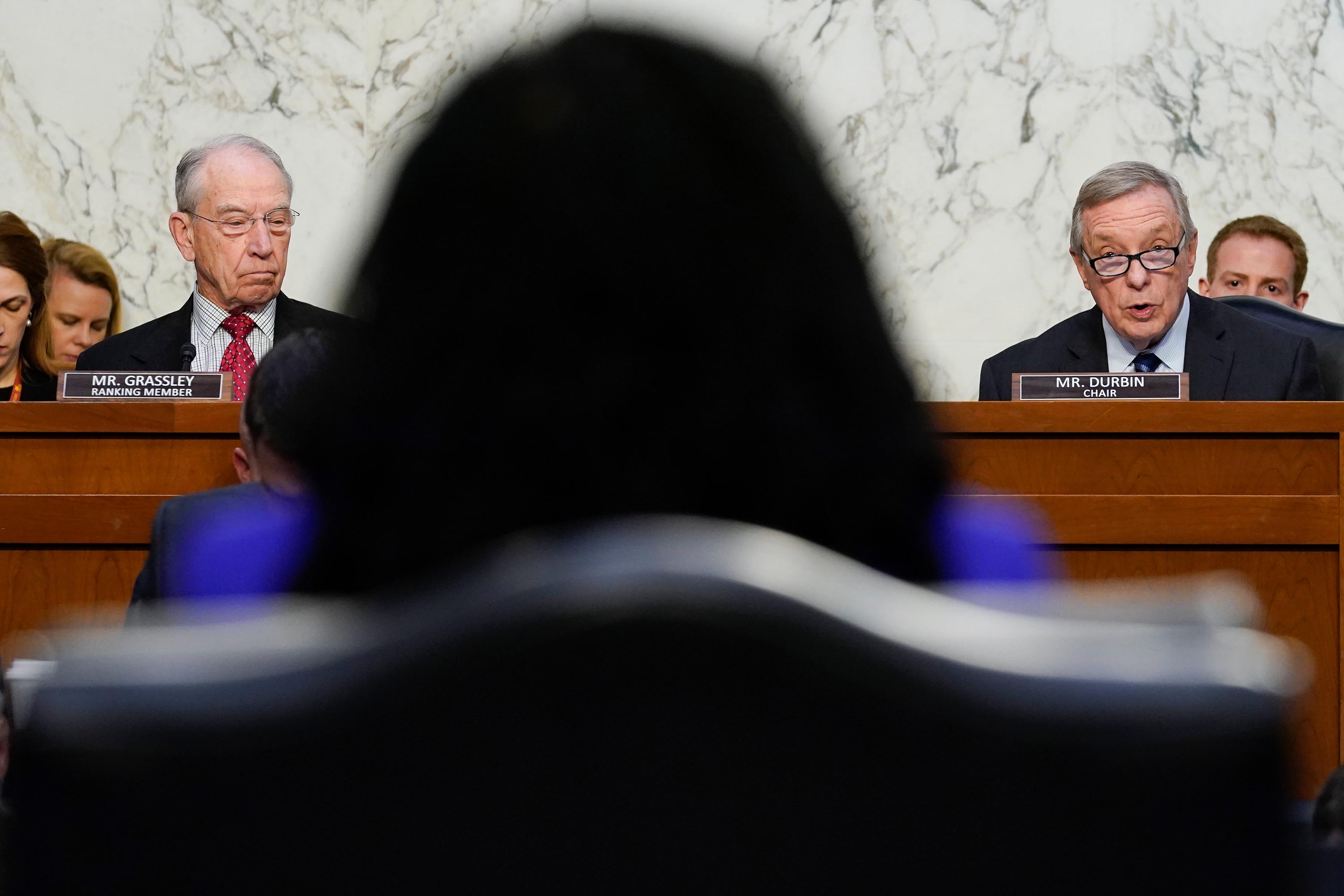 Sen. Dick Durbin, chairman of the Senate Judiciary Committee, right, speaks as Supreme Court nominee Ketanji Brown Jackson listens during a Senate Judiciary Committee confirmation hearing on Capitol Hill in Washington, Monday, March 21, 2022.