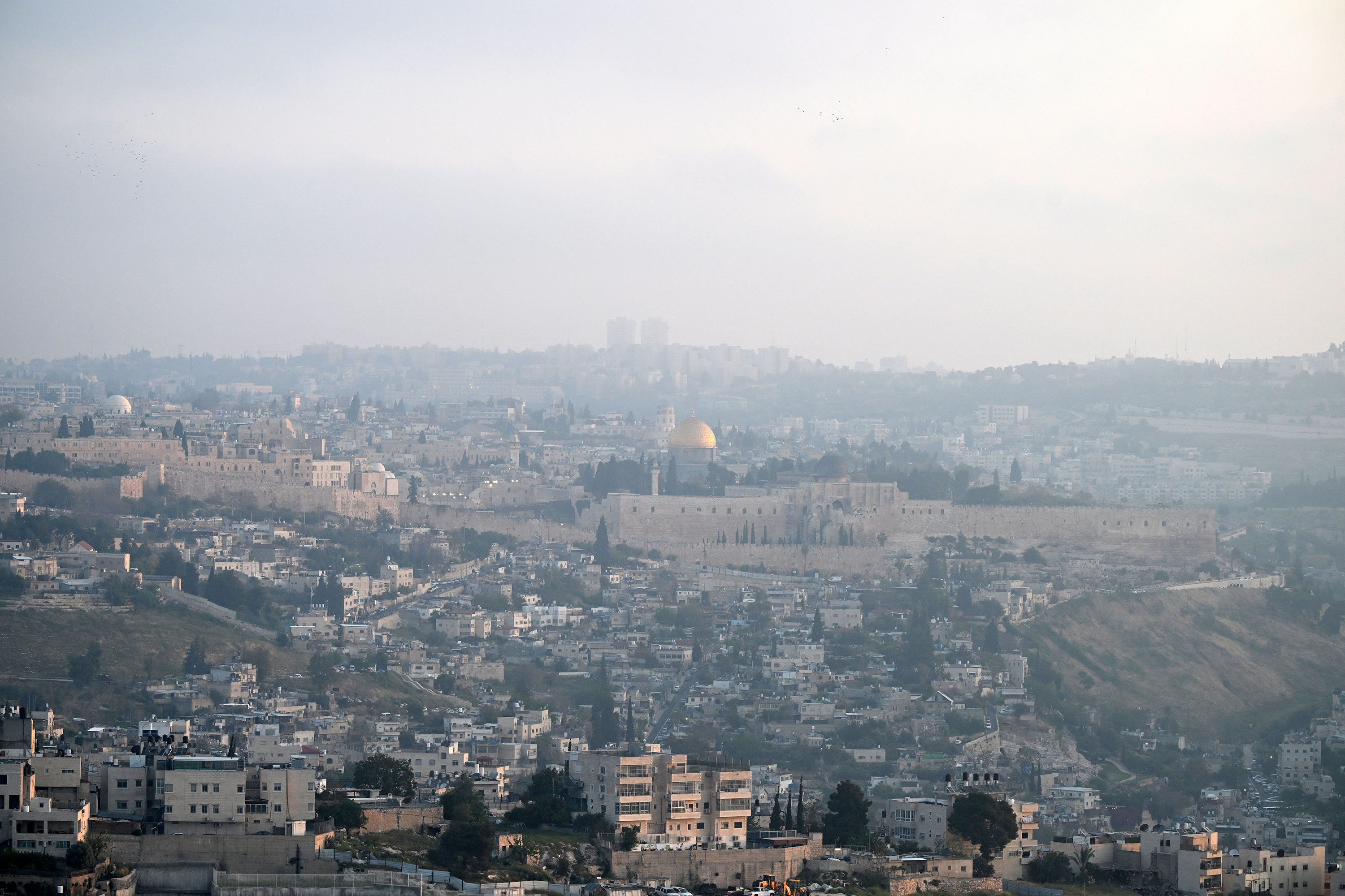 Jerusalem's Old City is pictured at dawn Sunday after Iran launched a drone and missile attack on Israel. 