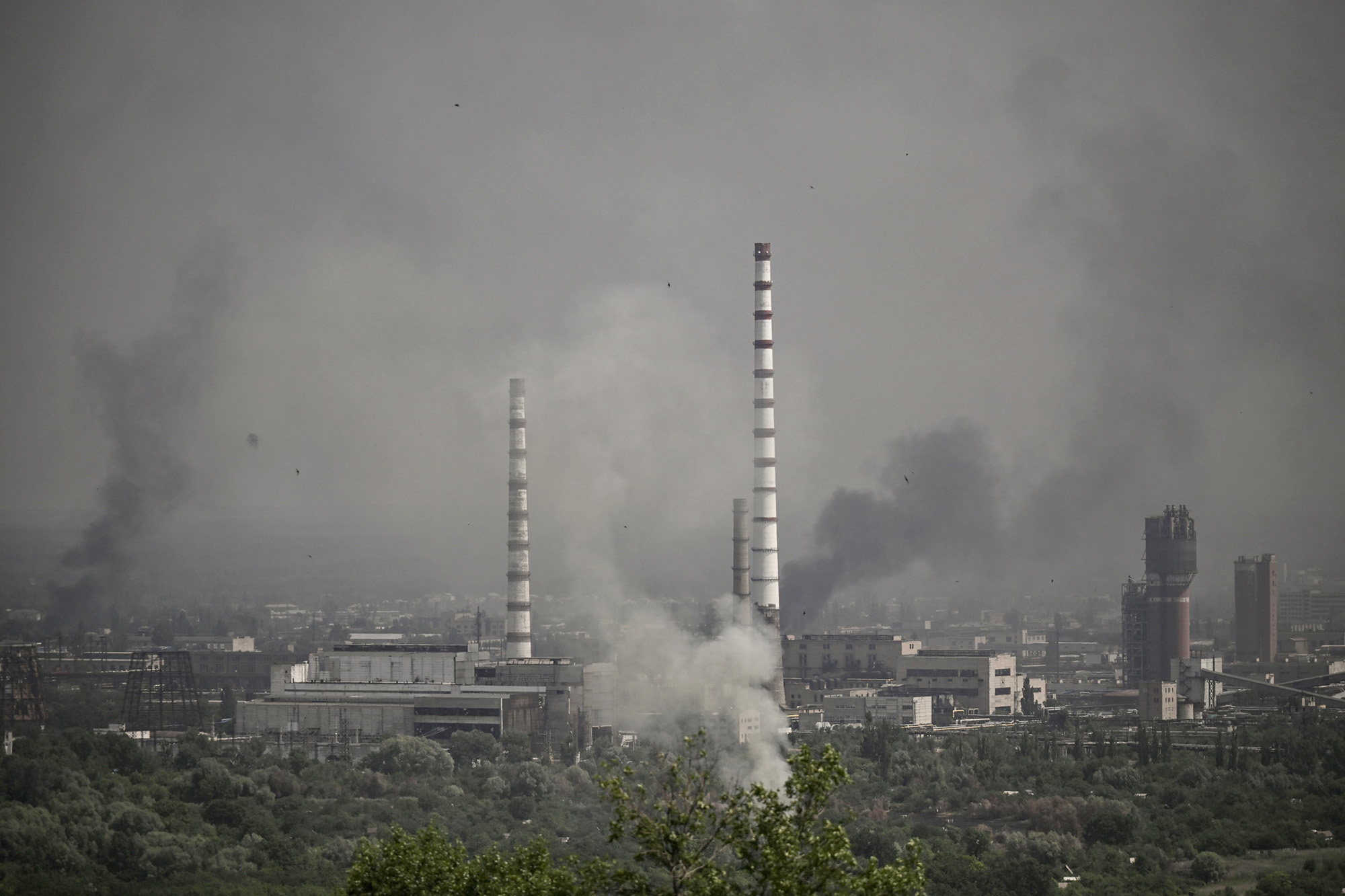 Smoke and dirt rise from the city of Severodonetsk, Ukraine, during fighting on June 14.