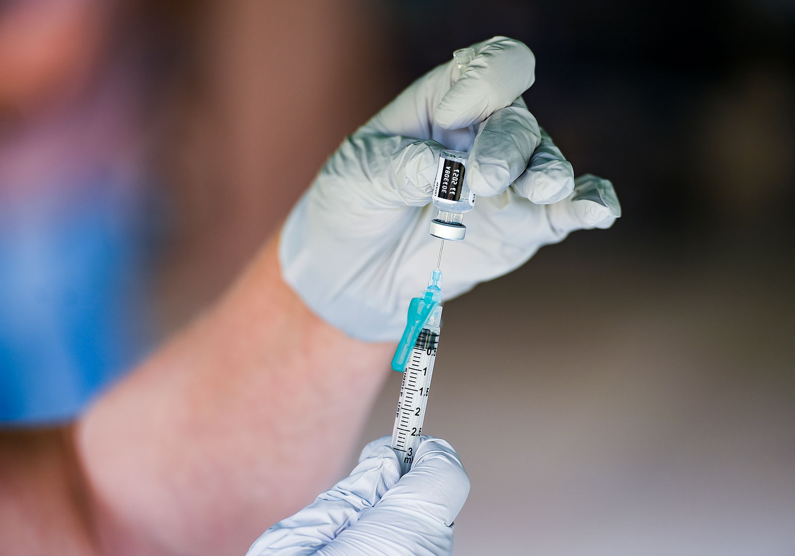 A nurse fills a syringe with a dose of the Pfizer/BioNTech vaccine on September 14 in Reading, Pennsylvania.