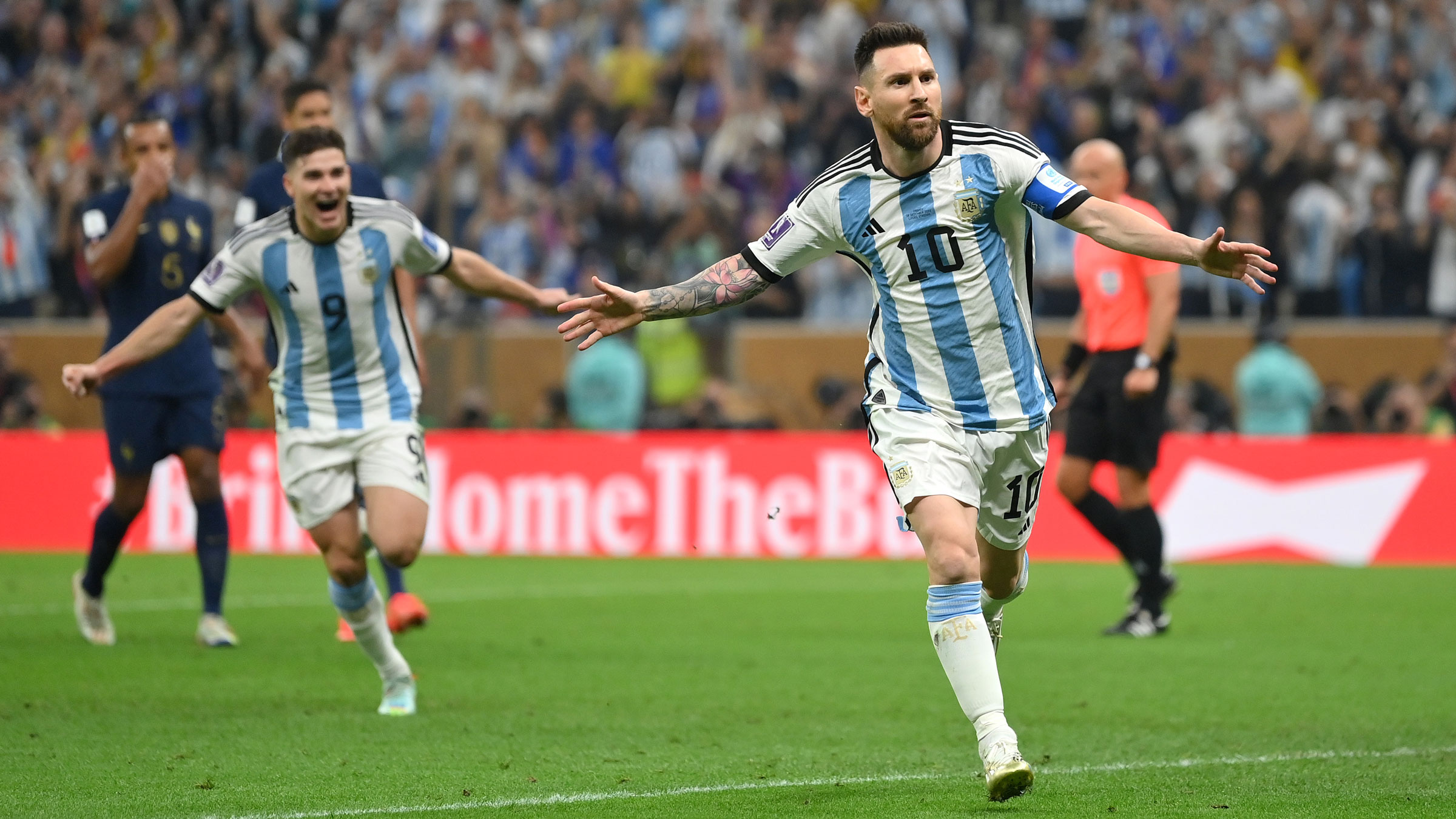 Lionel Messi celebrates after scoring on a first-half penalty.