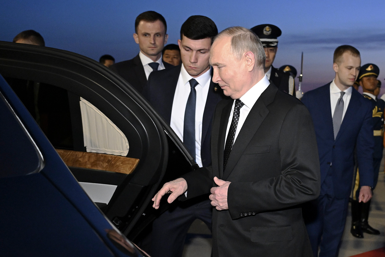 Russia's President Vladimir Putin gets into a vehicle upon arrival at the Beijing Capital International Airport on May 16.