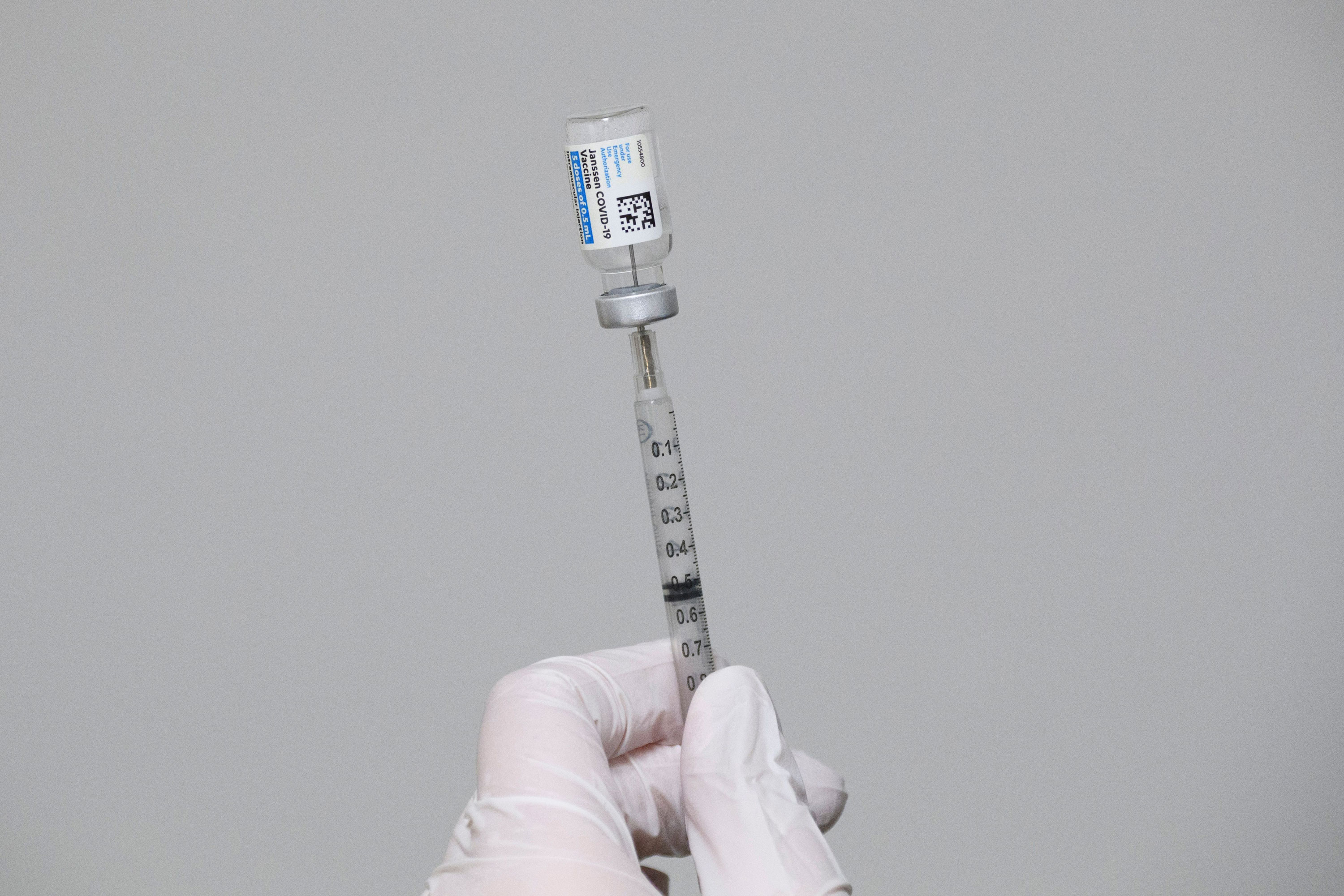 A syringe is filled with a dose of the Johnson & Johnson Janssen Covid-19 vaccine at a vaccination site inside Reuther Hall at Forty Acres on March 13 in Delano, California. 