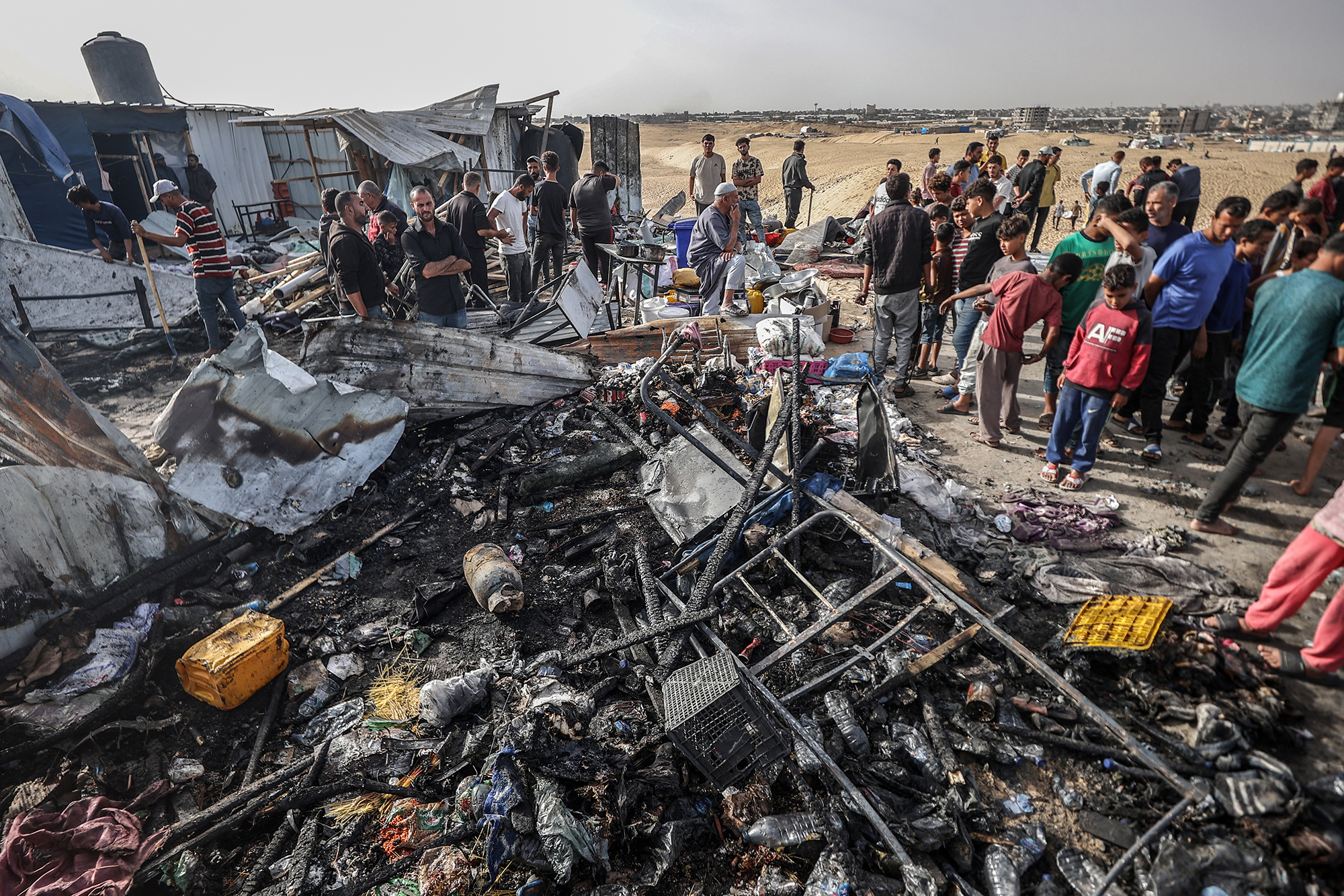 Palestinians at the scene of an Israeli attack in Rafah, Gaza, on May 27.
