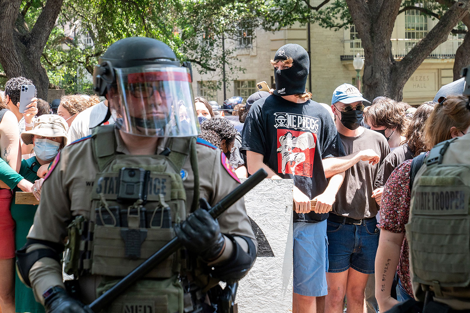 A Texas State trooper stands gurad near pro-Palestinian demomstrators at the University of Texas in Austin, Texas, on April 29.