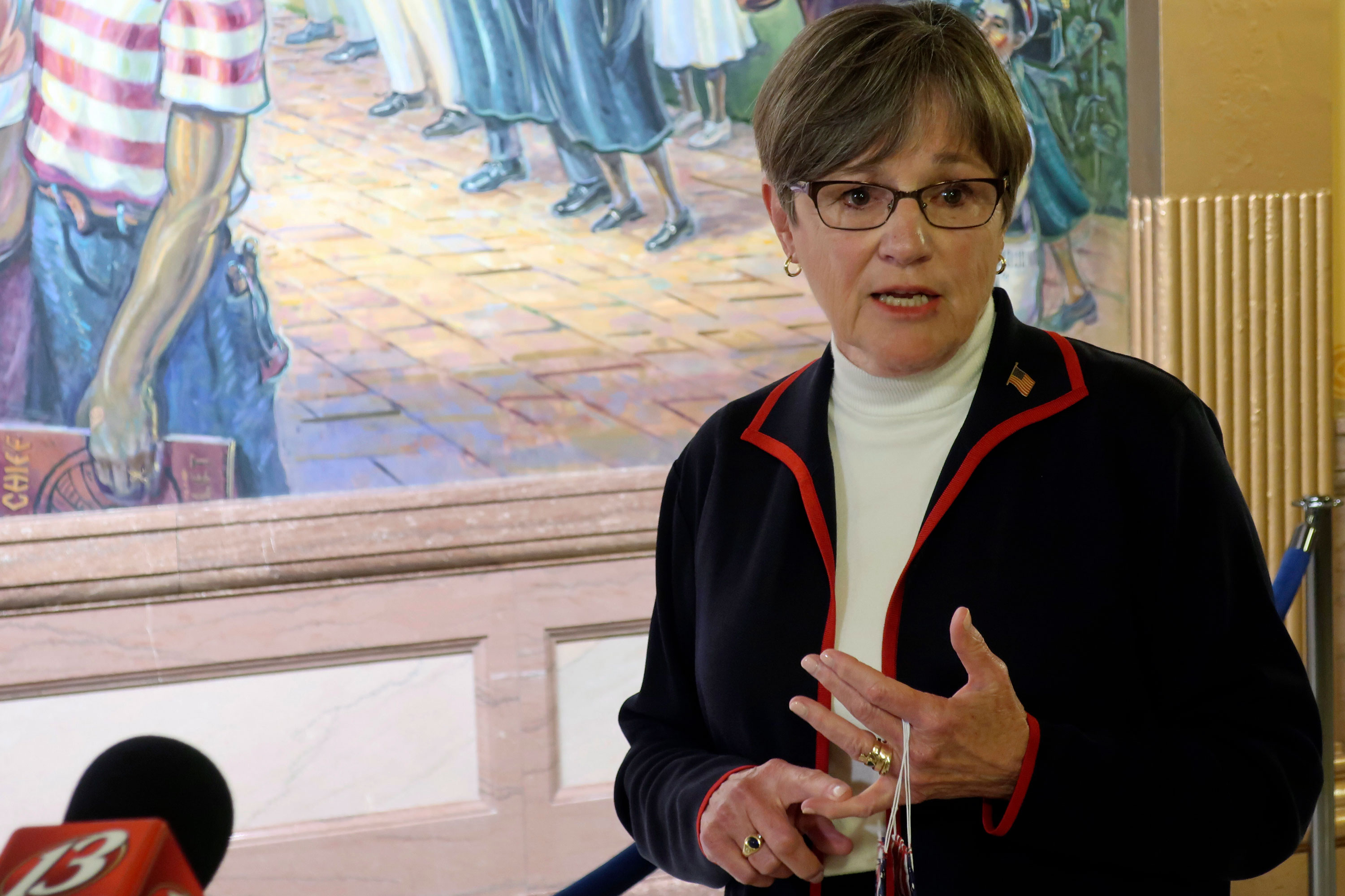 Kansas Gov. Laura Kelly answers questions from reporters about the coronavirus pandemic on July 2 at the Statehouse in Topeka, Kansas.
