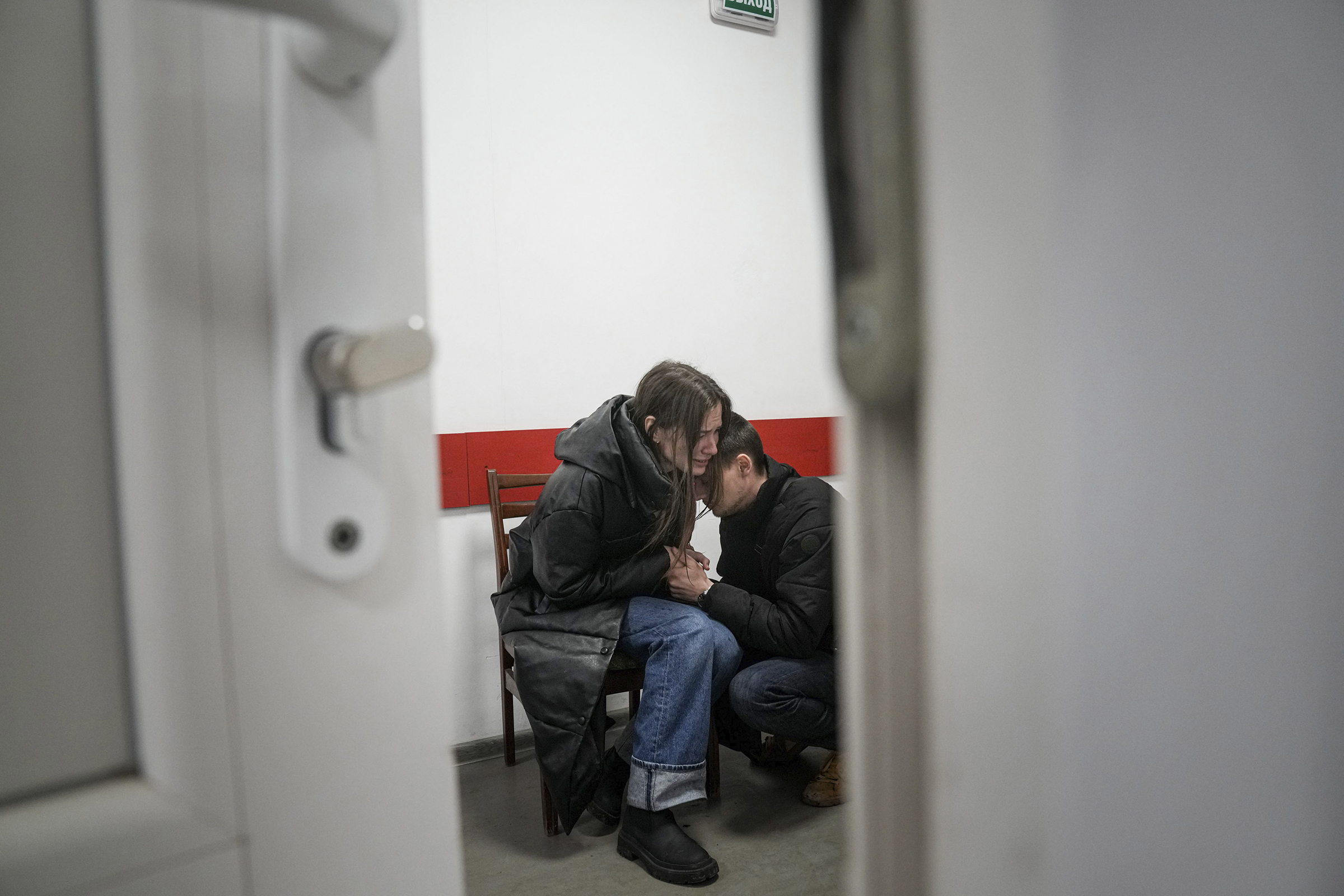 Marina Yatsko and her boyfriend Fedor comfort each other after her 18-month-old son Kirill was killed by shelling in a hospital in Mariupol, Ukraine, on Friday, March 4. 