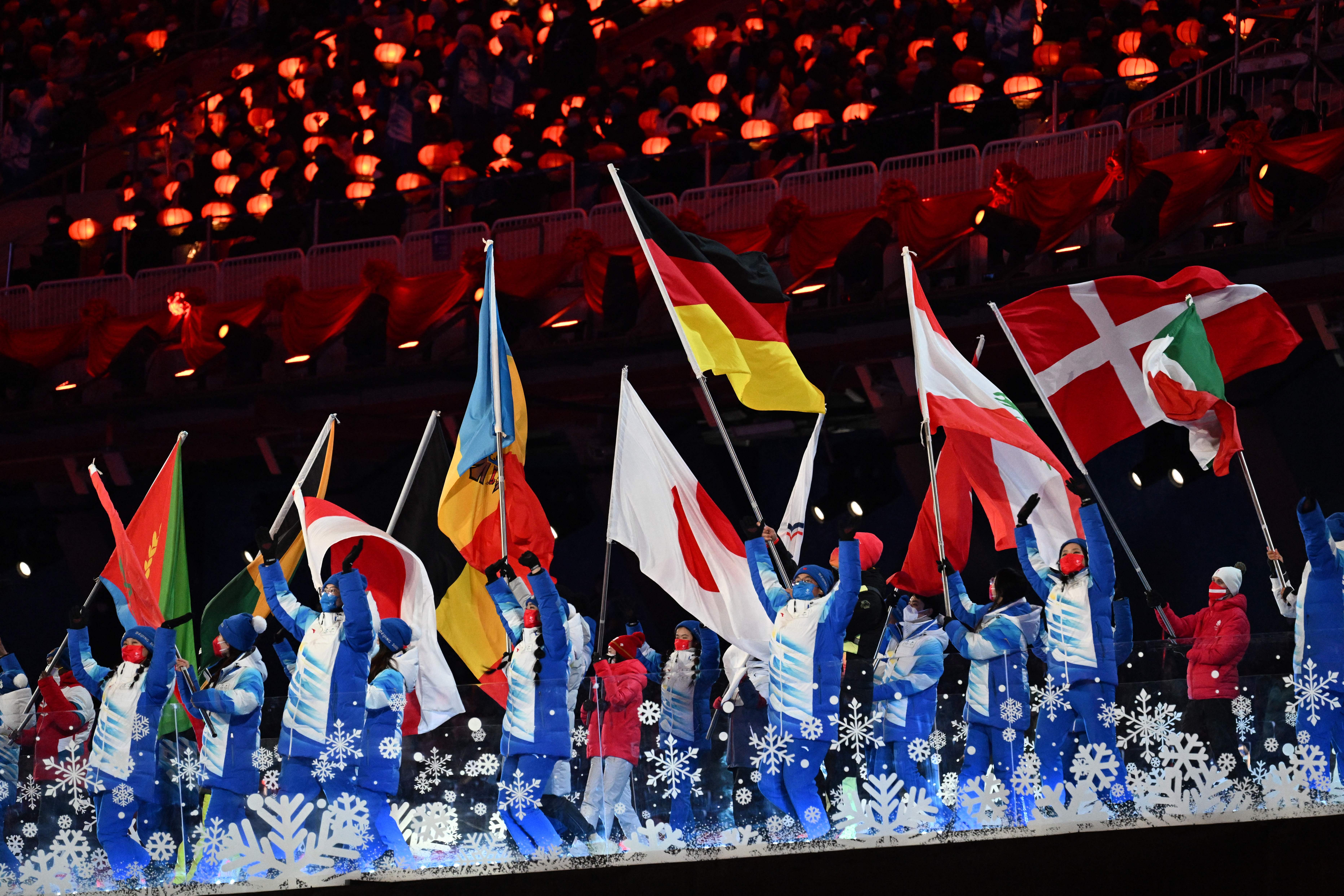 Flagbearers of participating countries parade during the closing ceremony of the Beijing 2022 Winter Olympic Games, in Beijing, China, on February 20.