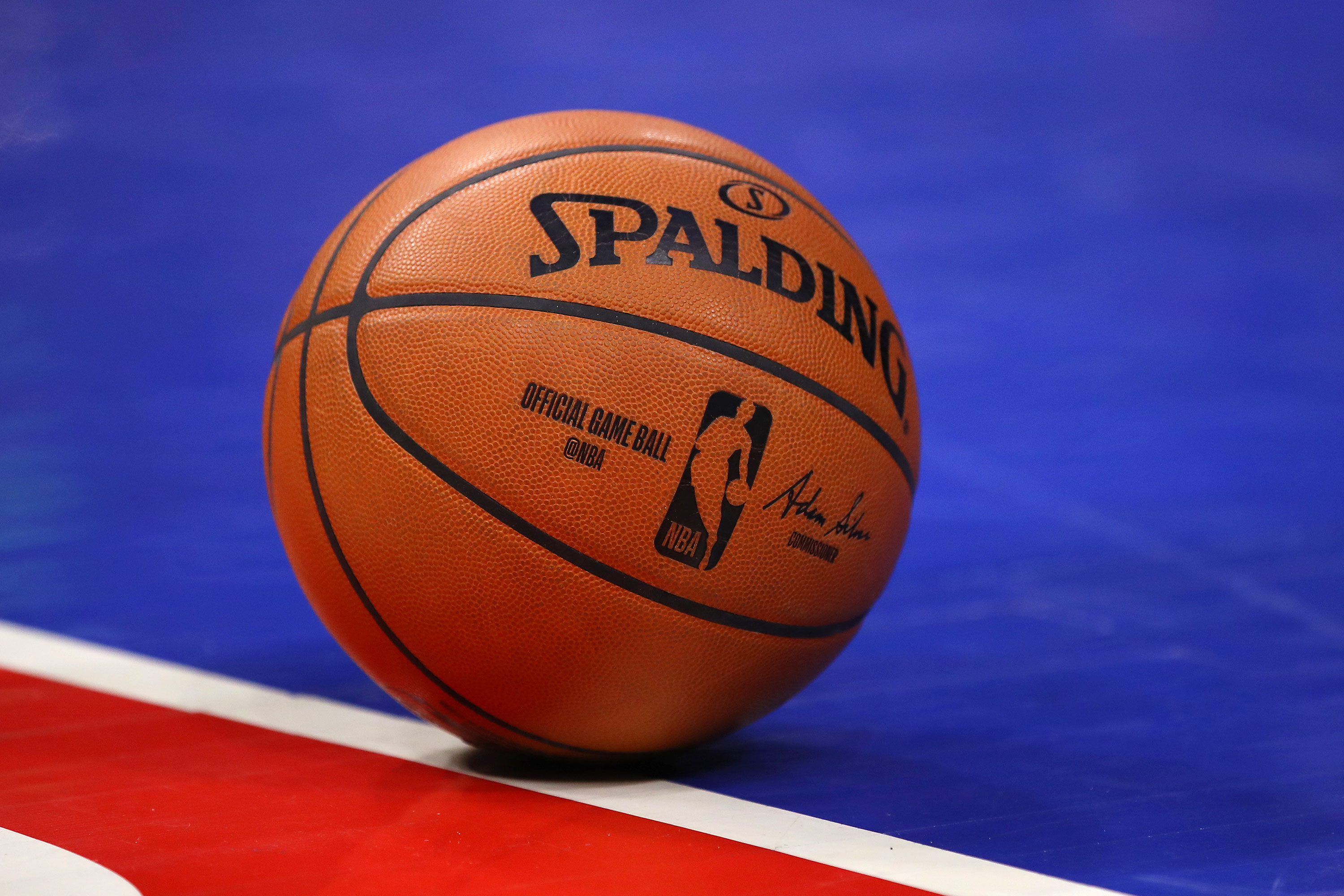 An official game ball sits on the court during a game between the Detroit Pistons and Milwaukee Bucks in Detroit on February 20.