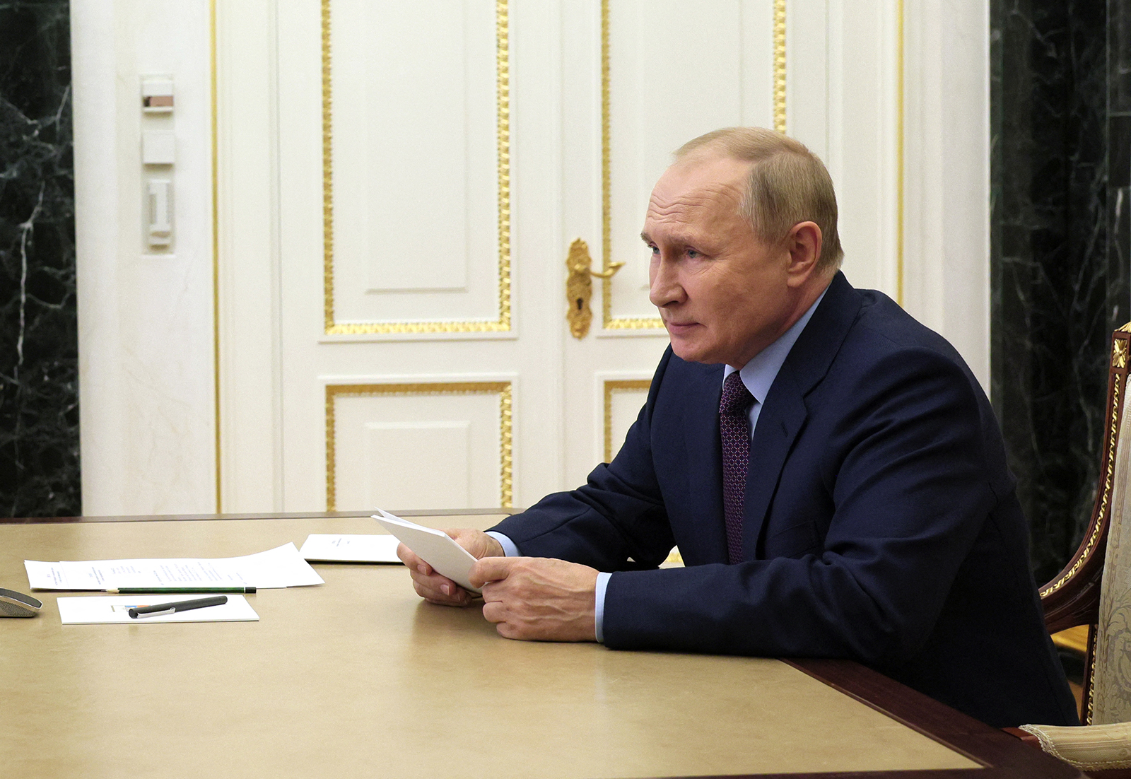 Russian President Vladimir Putin chairs a meeting on economic issues via a video link at the Kremlin in Moscow on Monday.