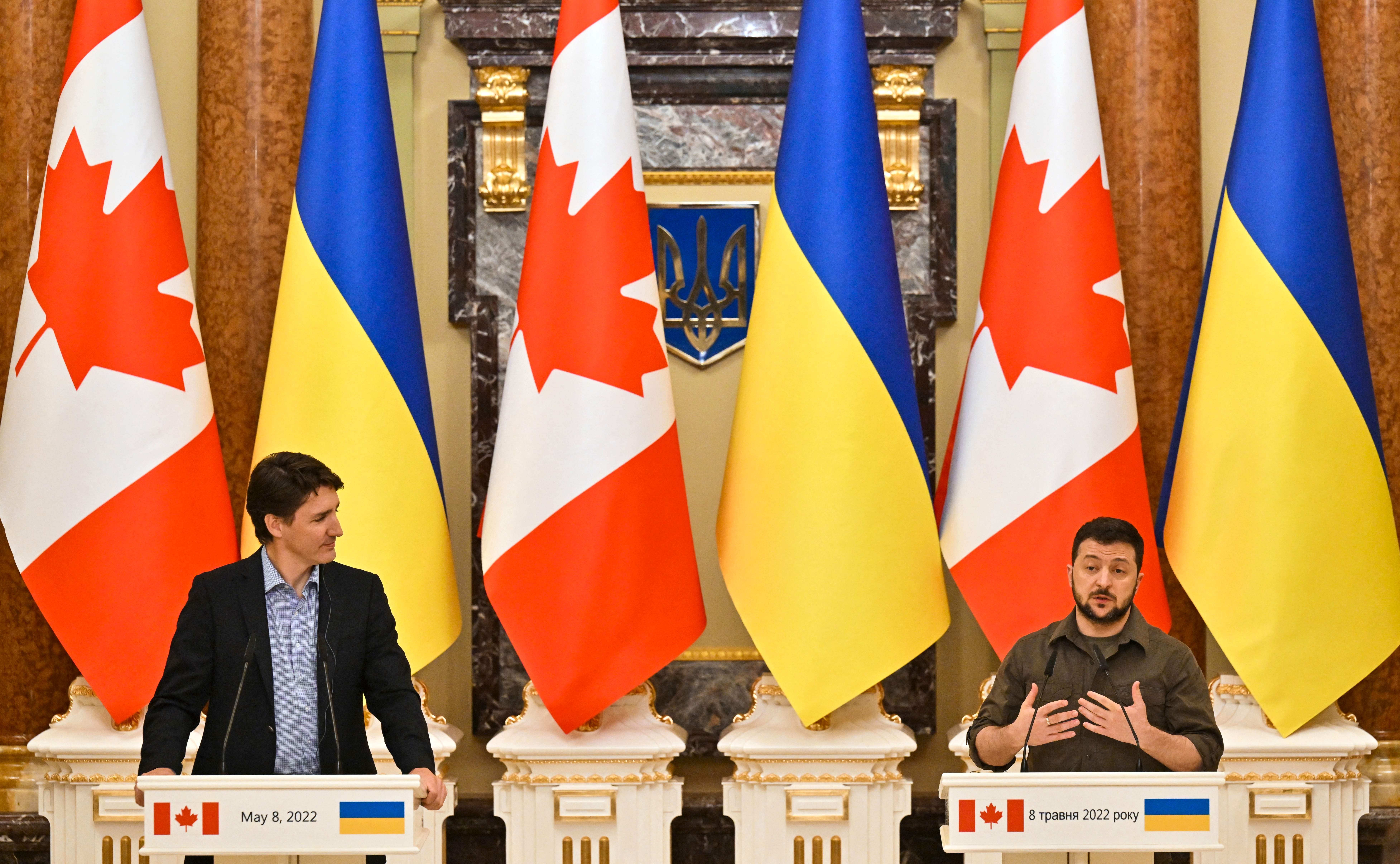 Ukrainian President Volodymyr Zelensky, right, and Canada's Prime Minister Justin Trudeau addresses a joint press conference in Kyiv, on Sunday.