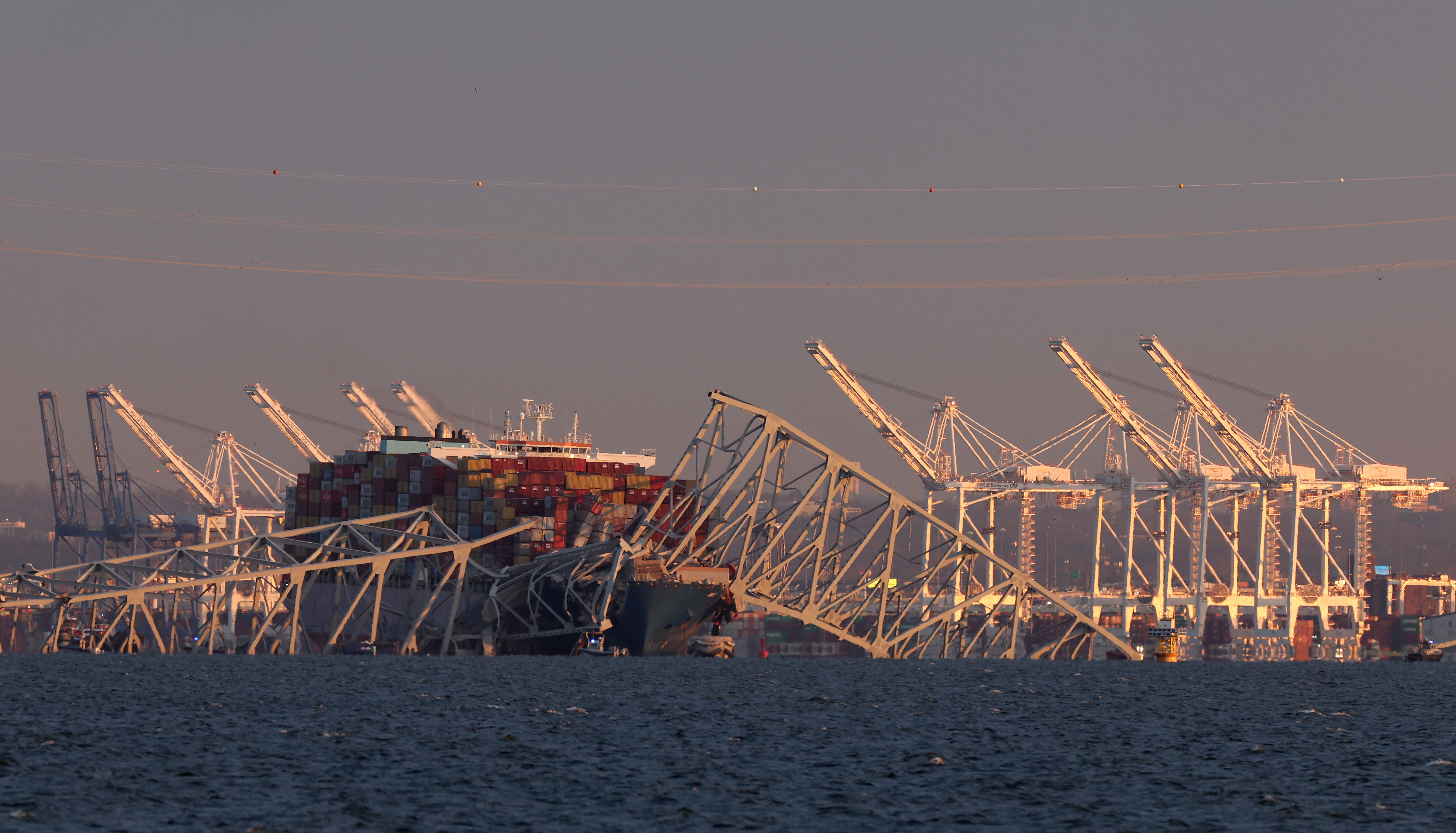 Scene showing the collapsed Francis Scott Key Bridge Tuesday in Maryland after it was struck by a cargo ship. 