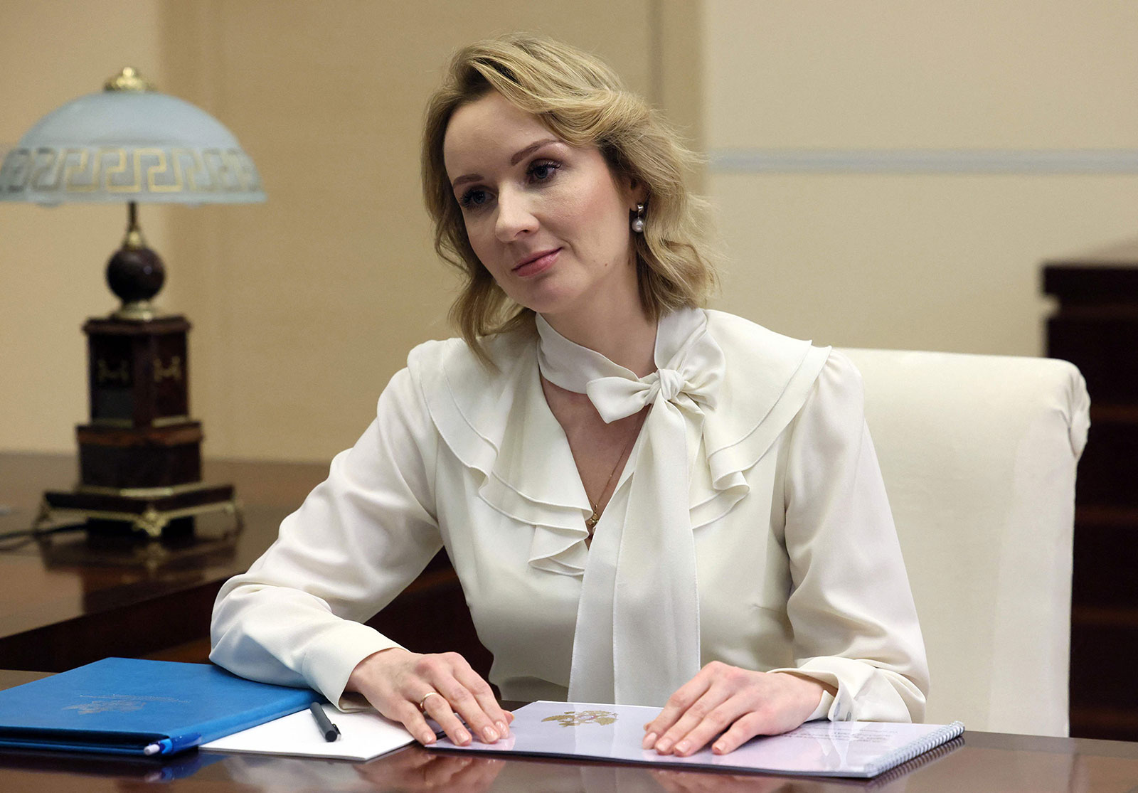 Maria Lvova-Belova, Russia's children commissioner, attends a meeting with Russian President Vladimir Putin